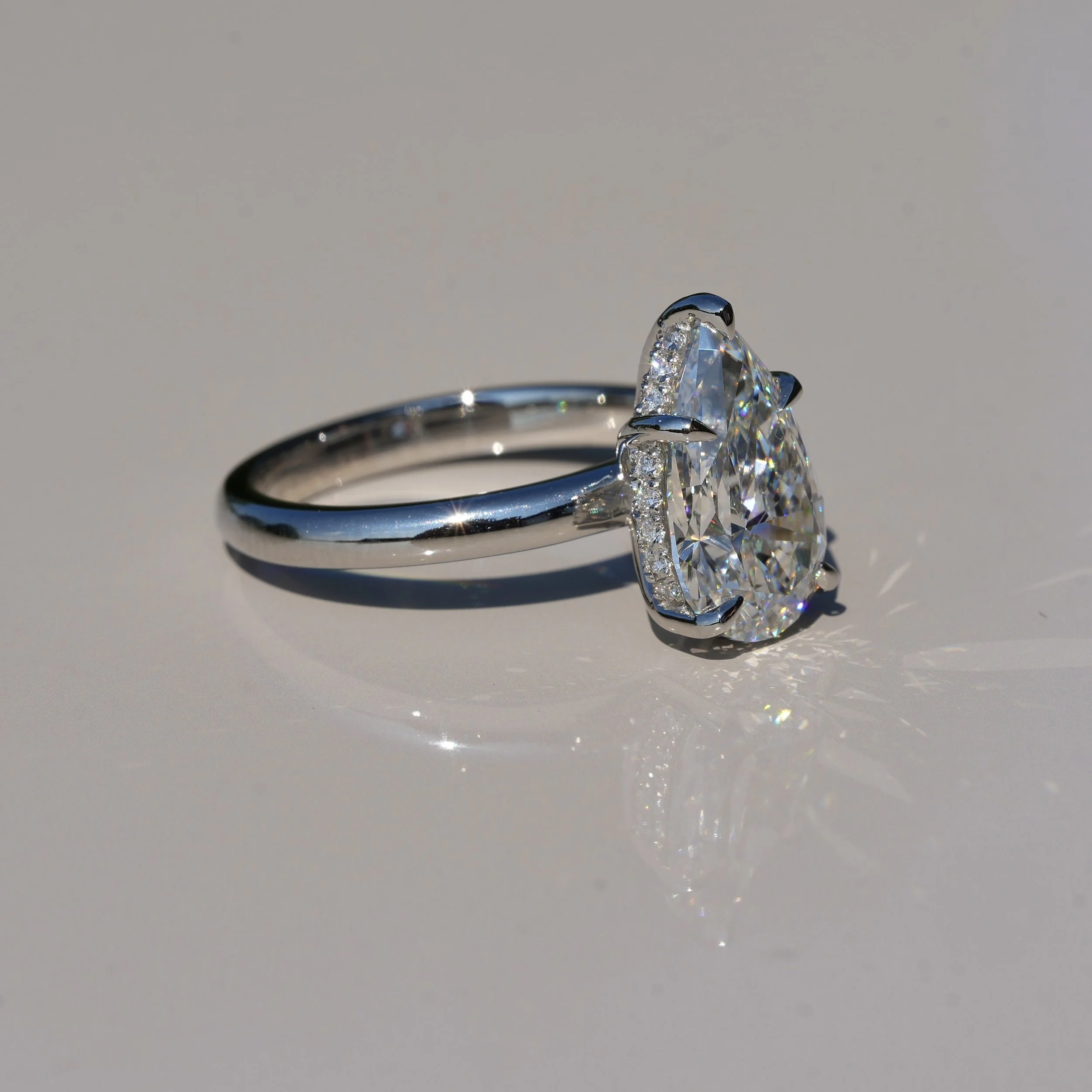 3ct Pear Cut Diamond Hidden Halo Ring in Platinum – IGI Certified – Front View | Eighty8Diamonds