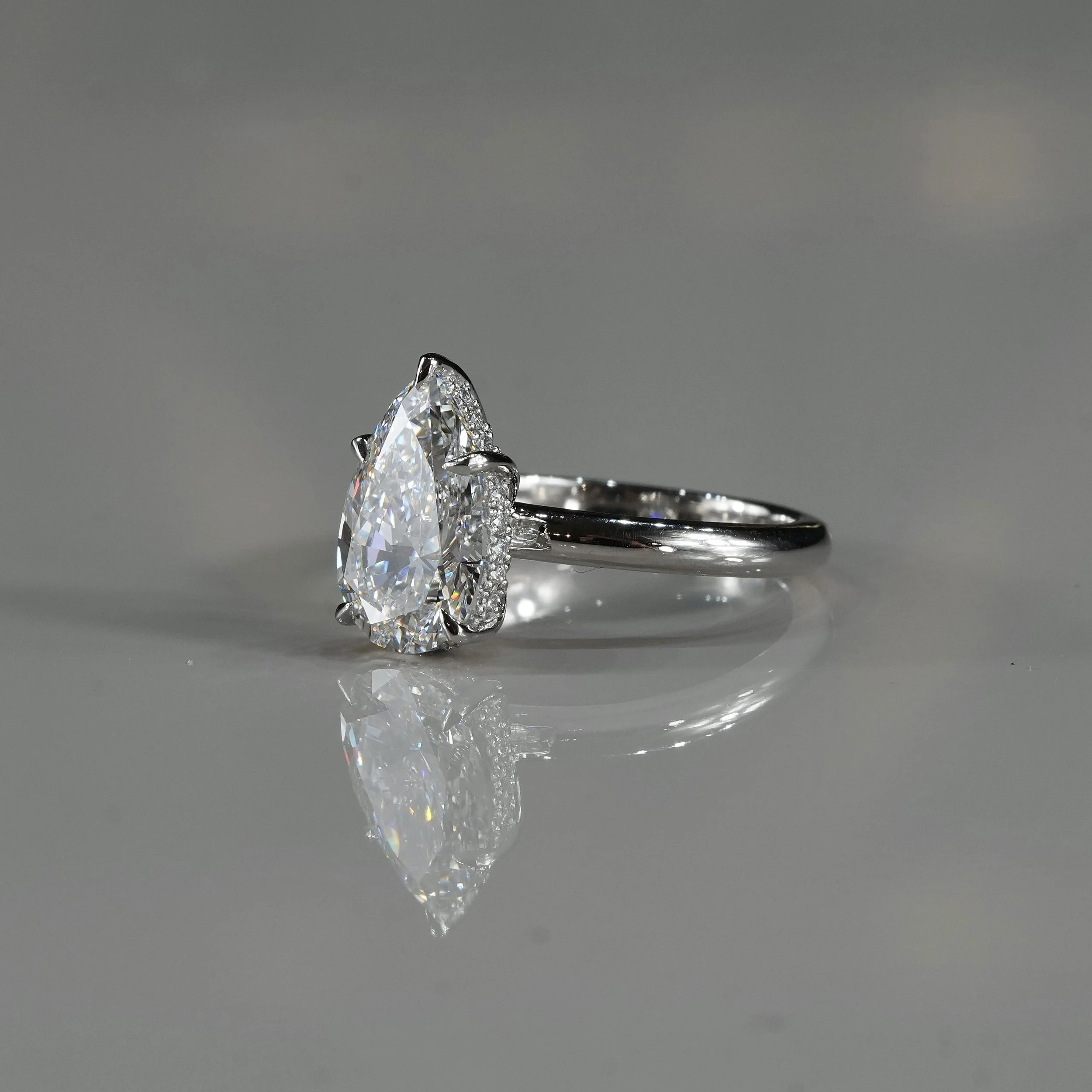 3ct Pear Cut Diamond Hidden Halo Ring in Platinum – IGI Certified – Side View | Eighty8Diamonds