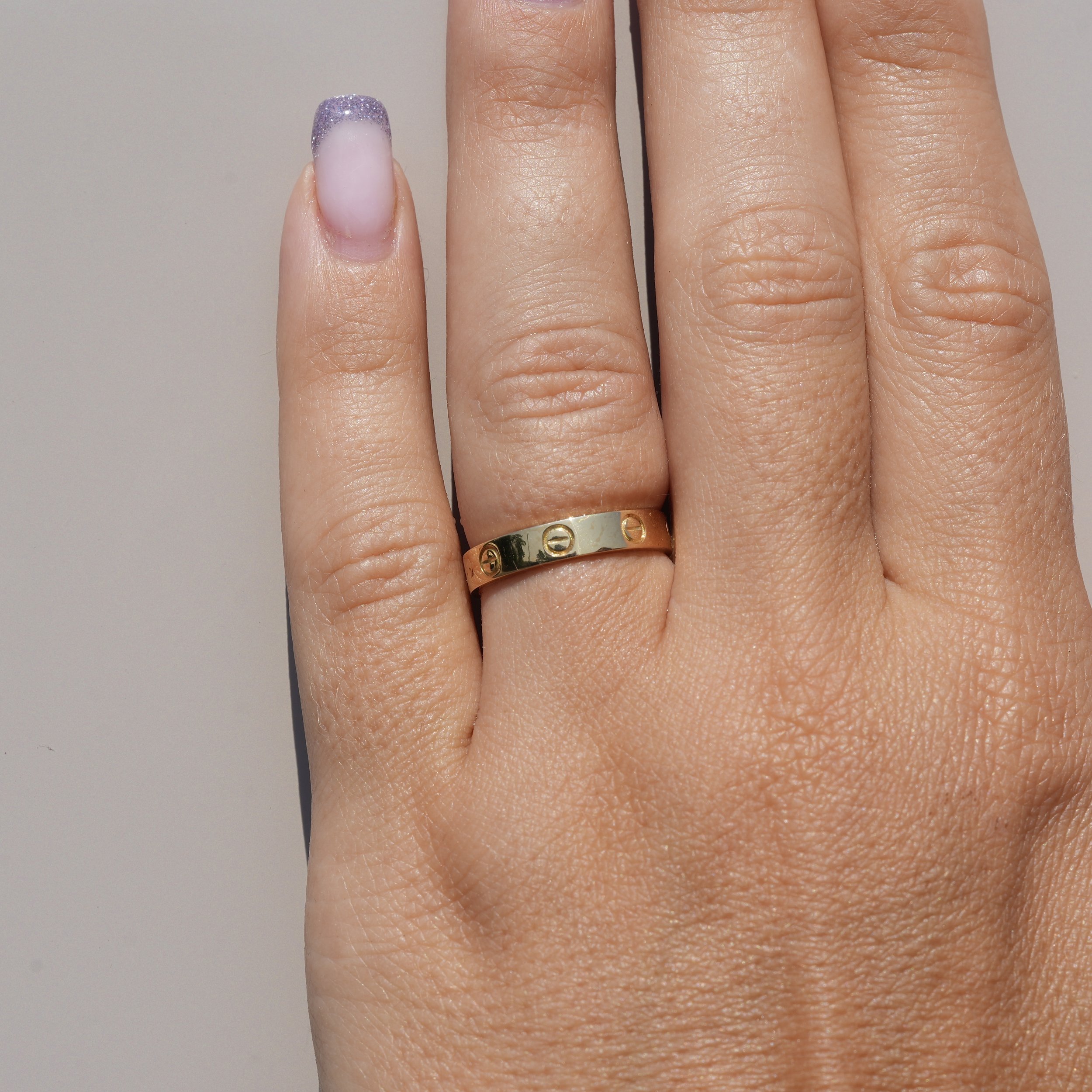 Women's Love Ring Classic Model in 18ct Yellow Gold  – Hand View | Eighty8Diamonds