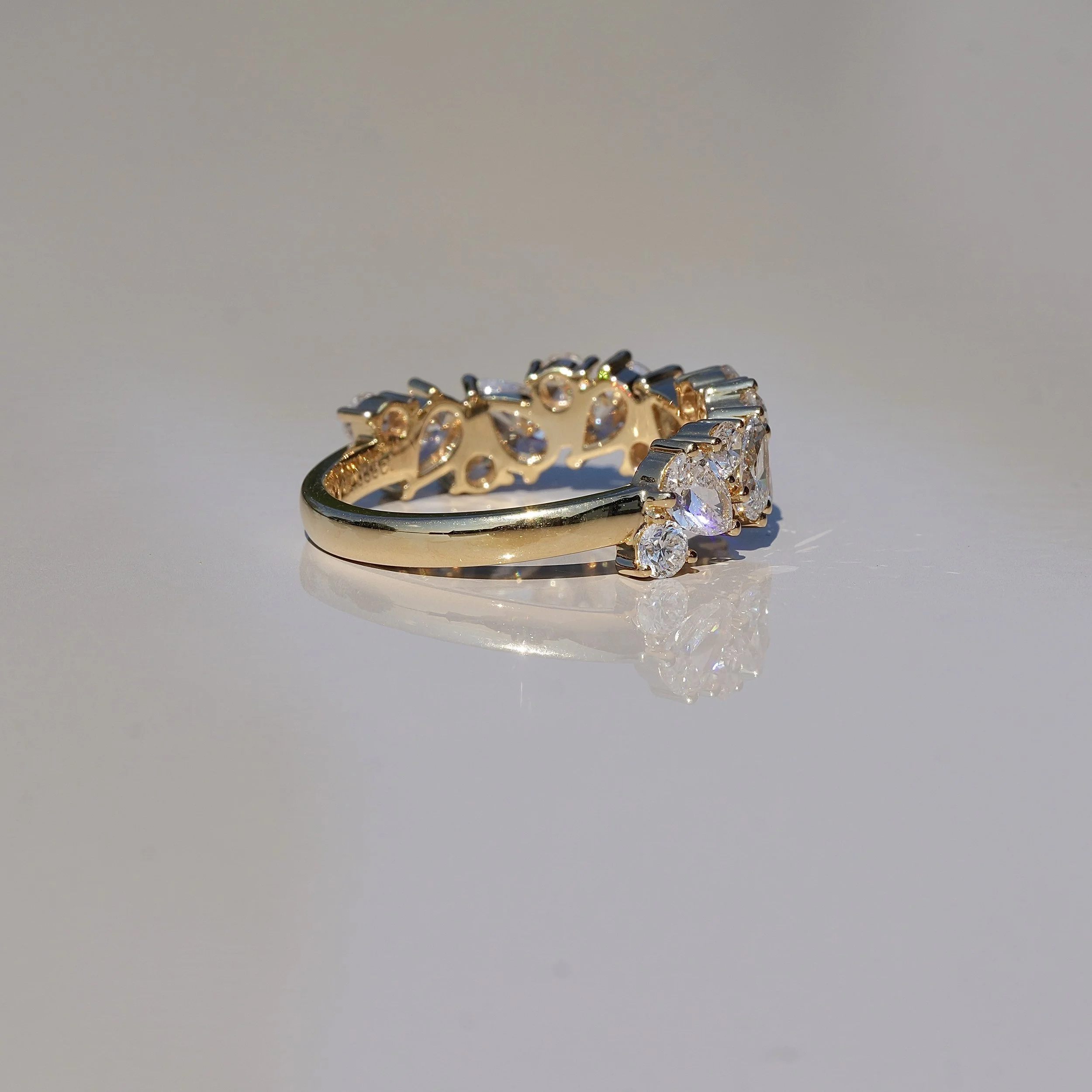 Half Eternity Wedding Ring with Pear and Round Cut Diamonds in 18ct Yellow Gold, Total Carat Weight 2ct – Angled View | Eighty8Diamonds