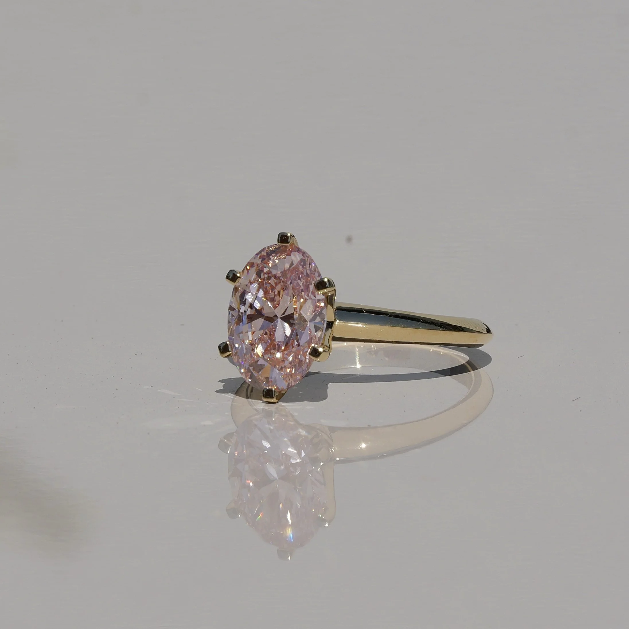 3ct Oval Cut Pink Diamond Engagement Ring  Flower Setting in 18ct Yellow Gold - Angeled View |