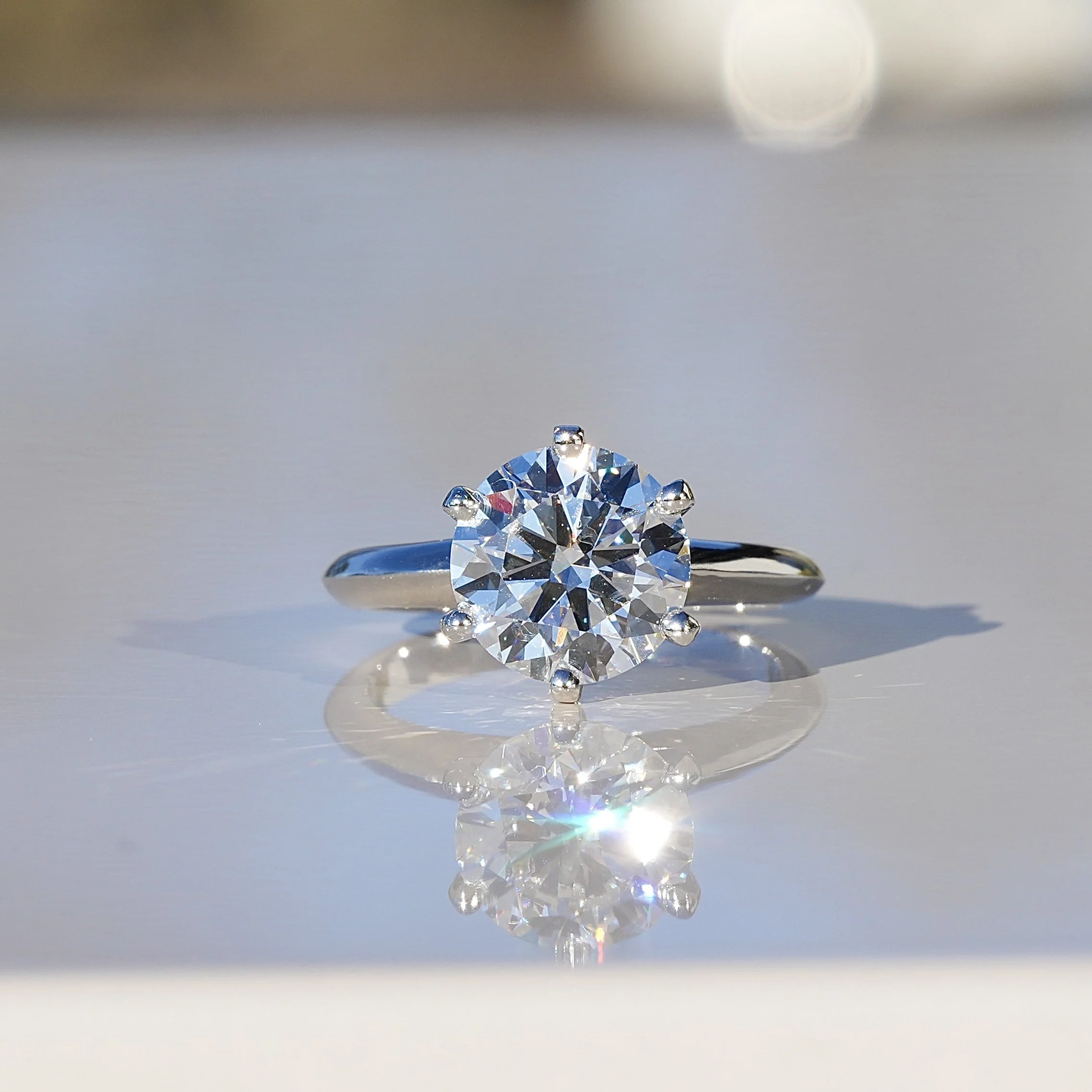 Tiffany Desing Diamond Solitaire Engagement Ring  in Platinum – Side View | Eighty8Diamonds