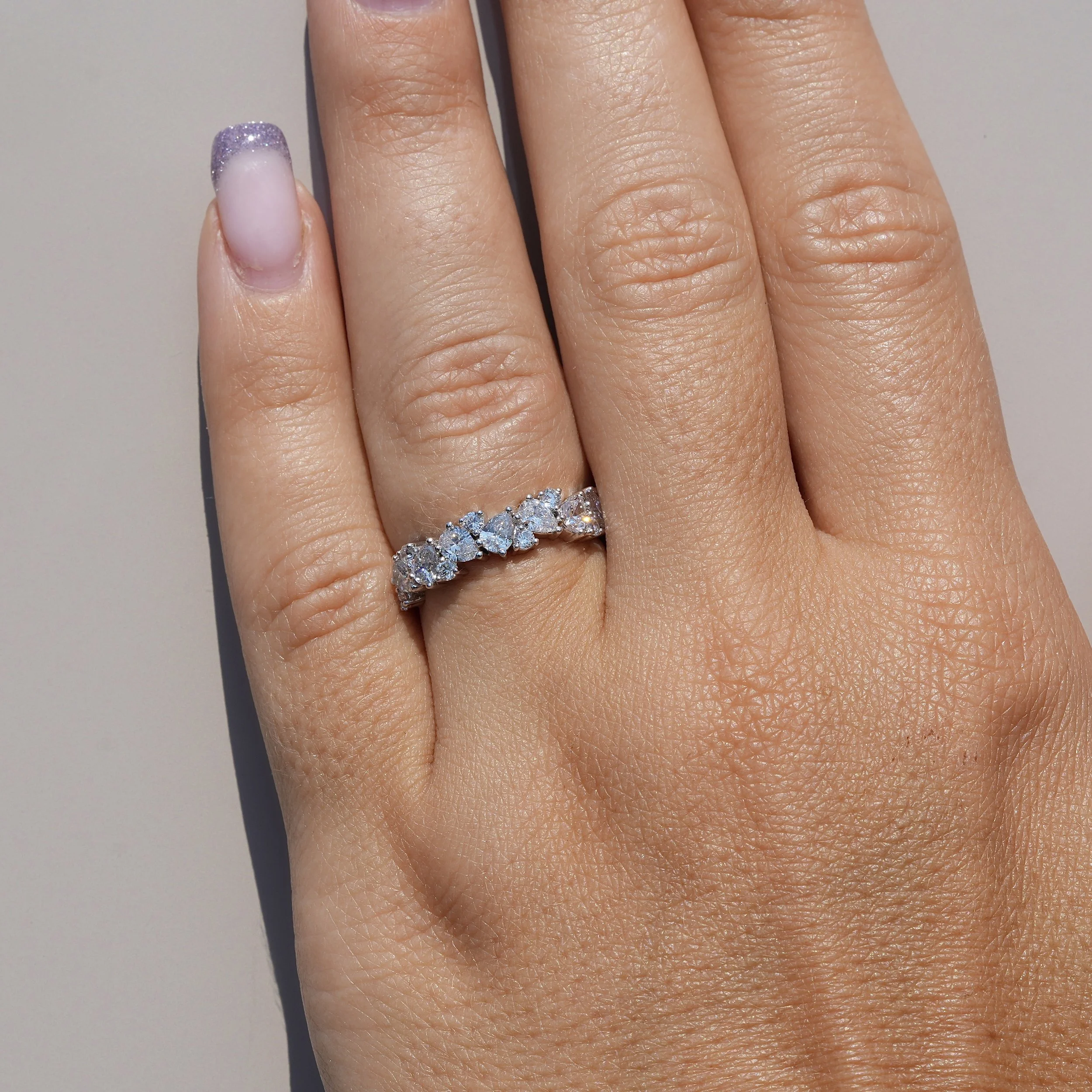 Half Eternity Wedding Ring with Pear and Round Cut Diamonds in Platinum, Total Carat Weight 1.45ct – Hand View | Eighty8Diamonds