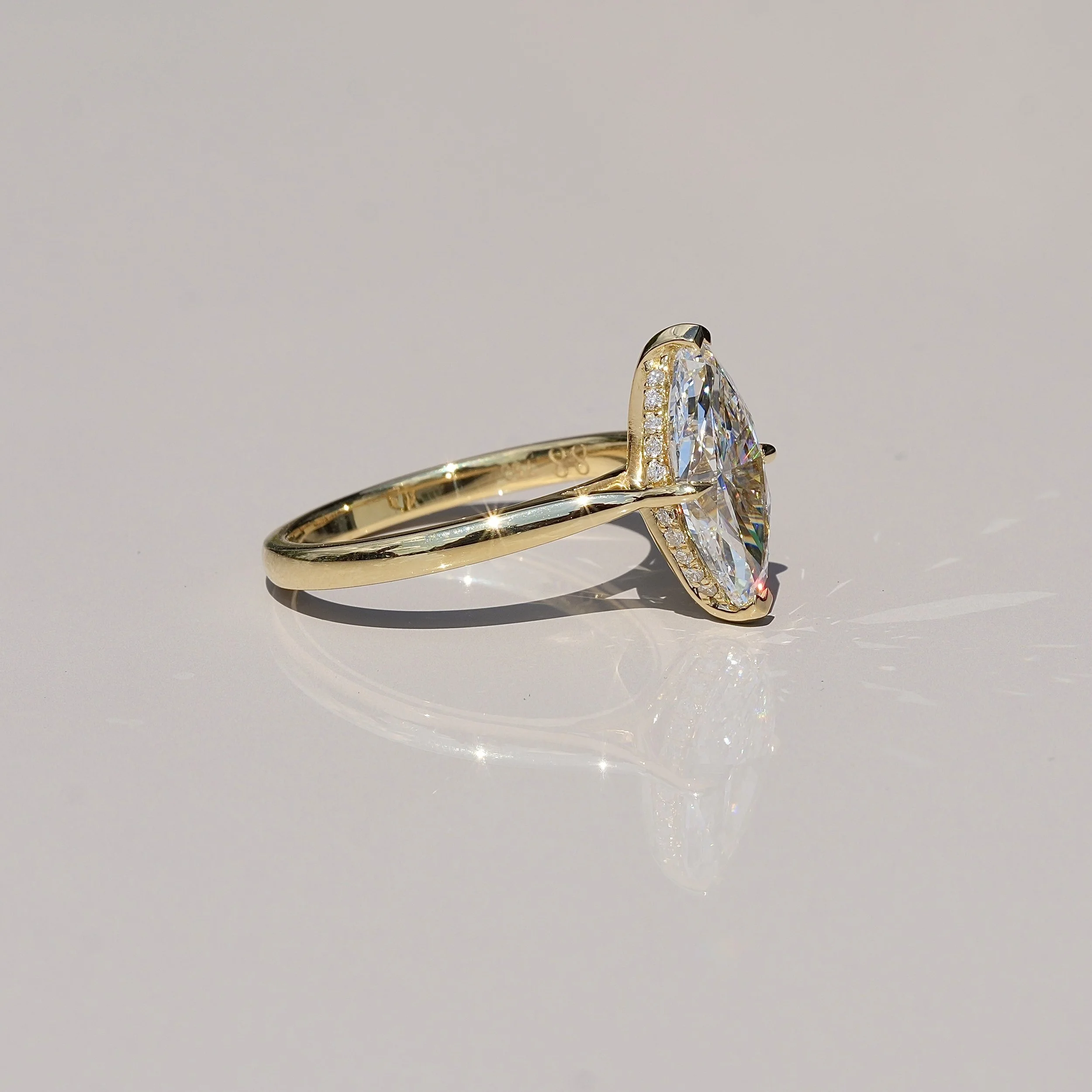 3ct Marquise Cut Diamond Solitaire Engagement Ring with Hidden Halo  in 18ct Yellow Gold – Side View | Eighty8Diamonds