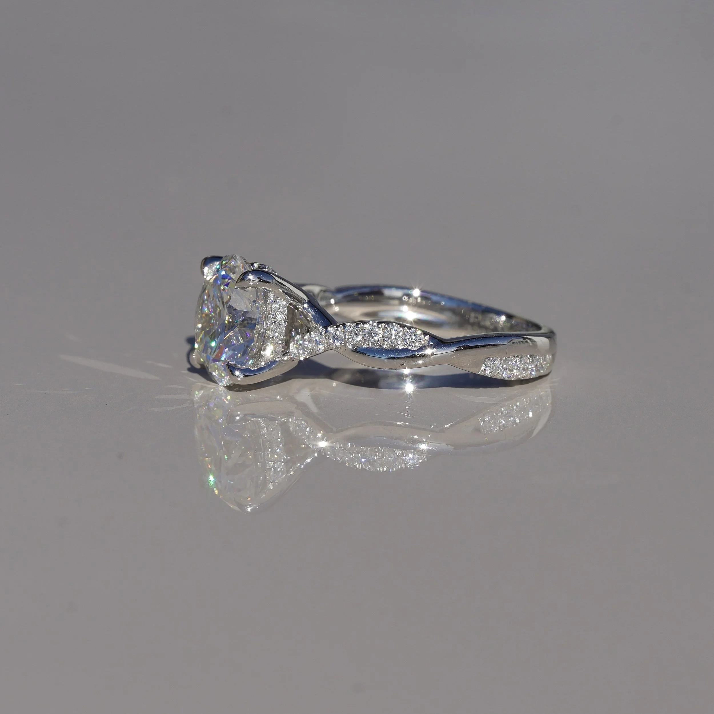 2ct Round Brilliant Diamond Twist  Band Ring in Platinum –Side View | Eighty8Diamonds