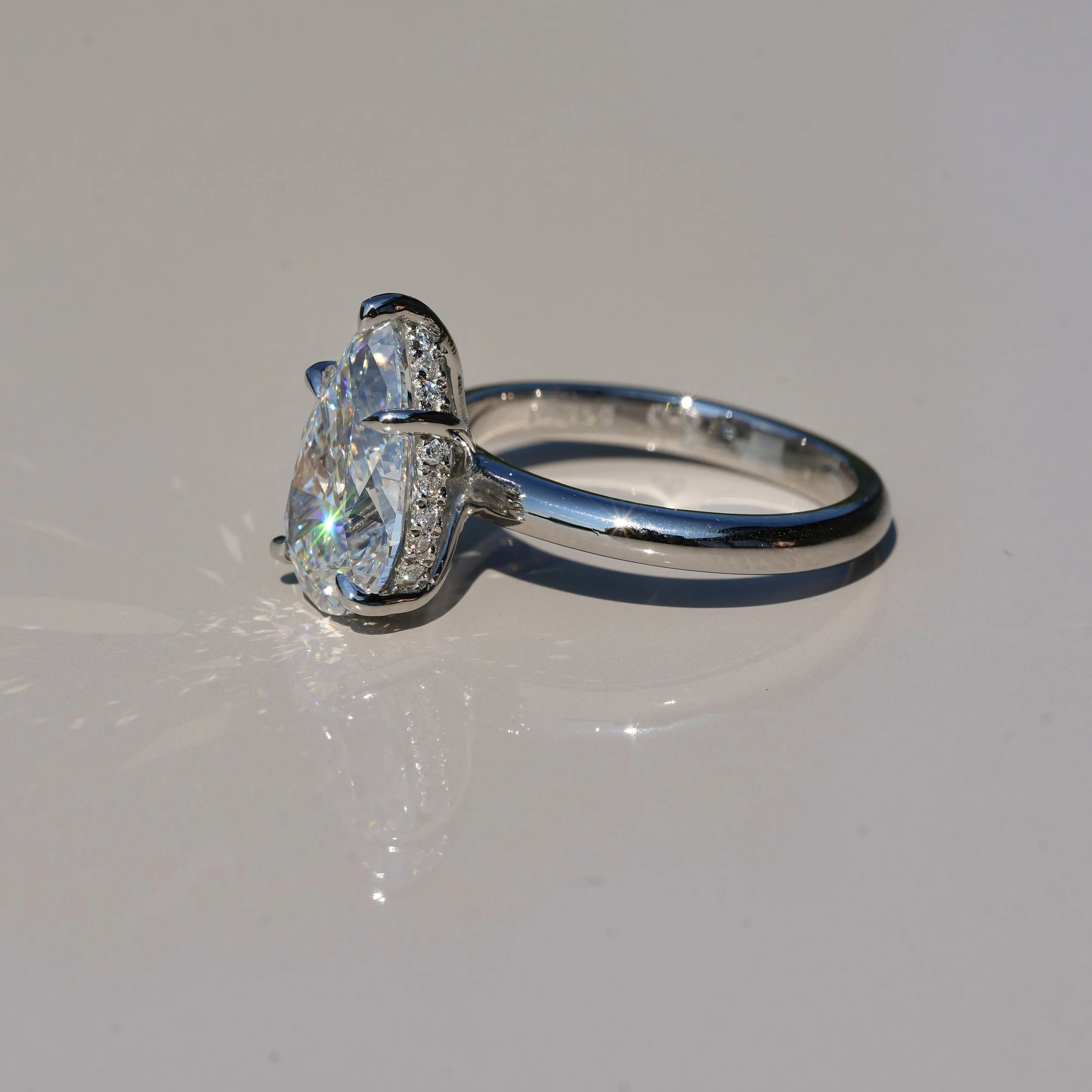 3ct Pear Cut Diamond Hidden Halo Ring in Platinum – IGI Certified –Angeled View | Eighty8Diamonds