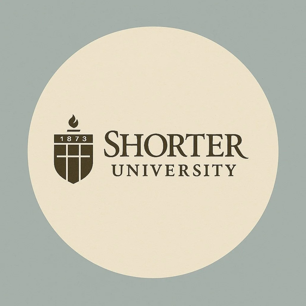 Shorter University logo with a shield featuring a flame and the year 1873.