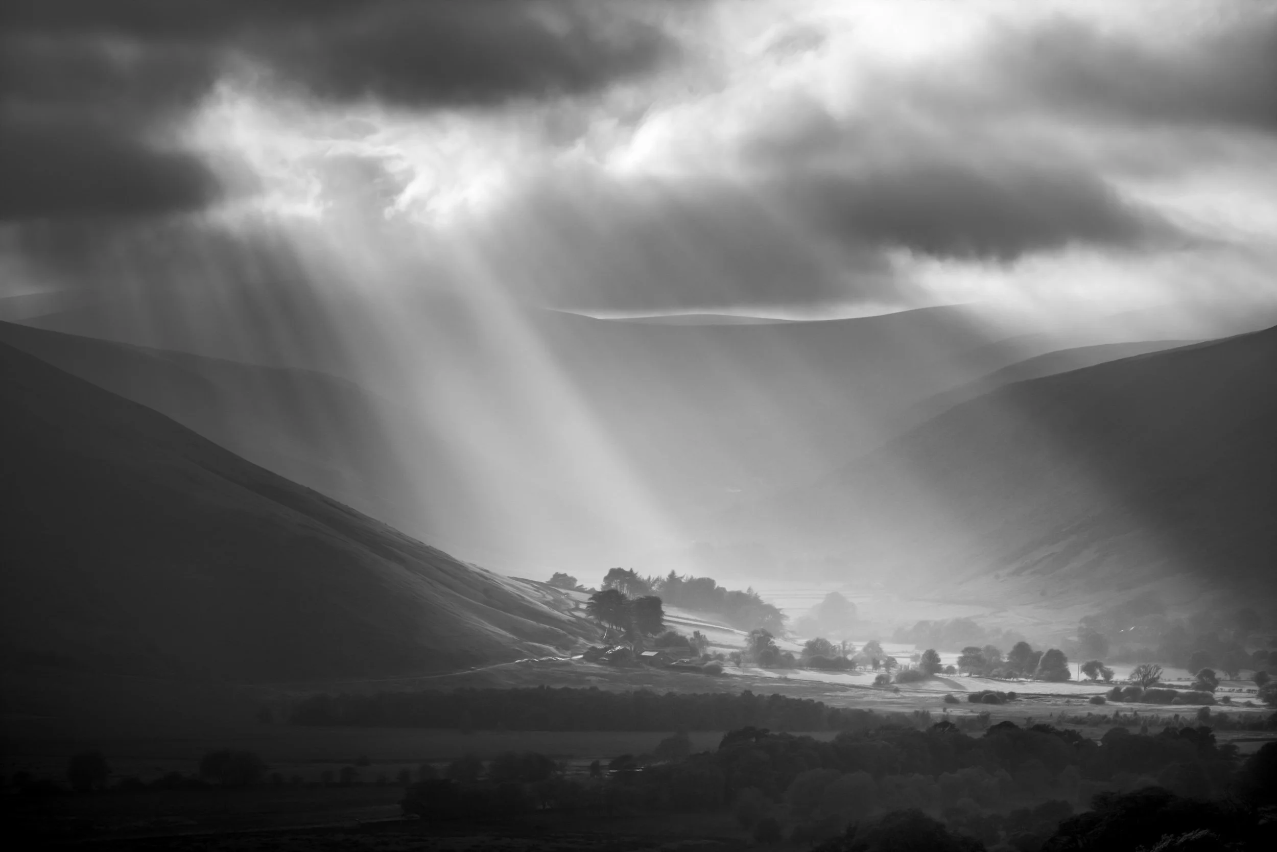 sun-pouring-village-mountains.jpg