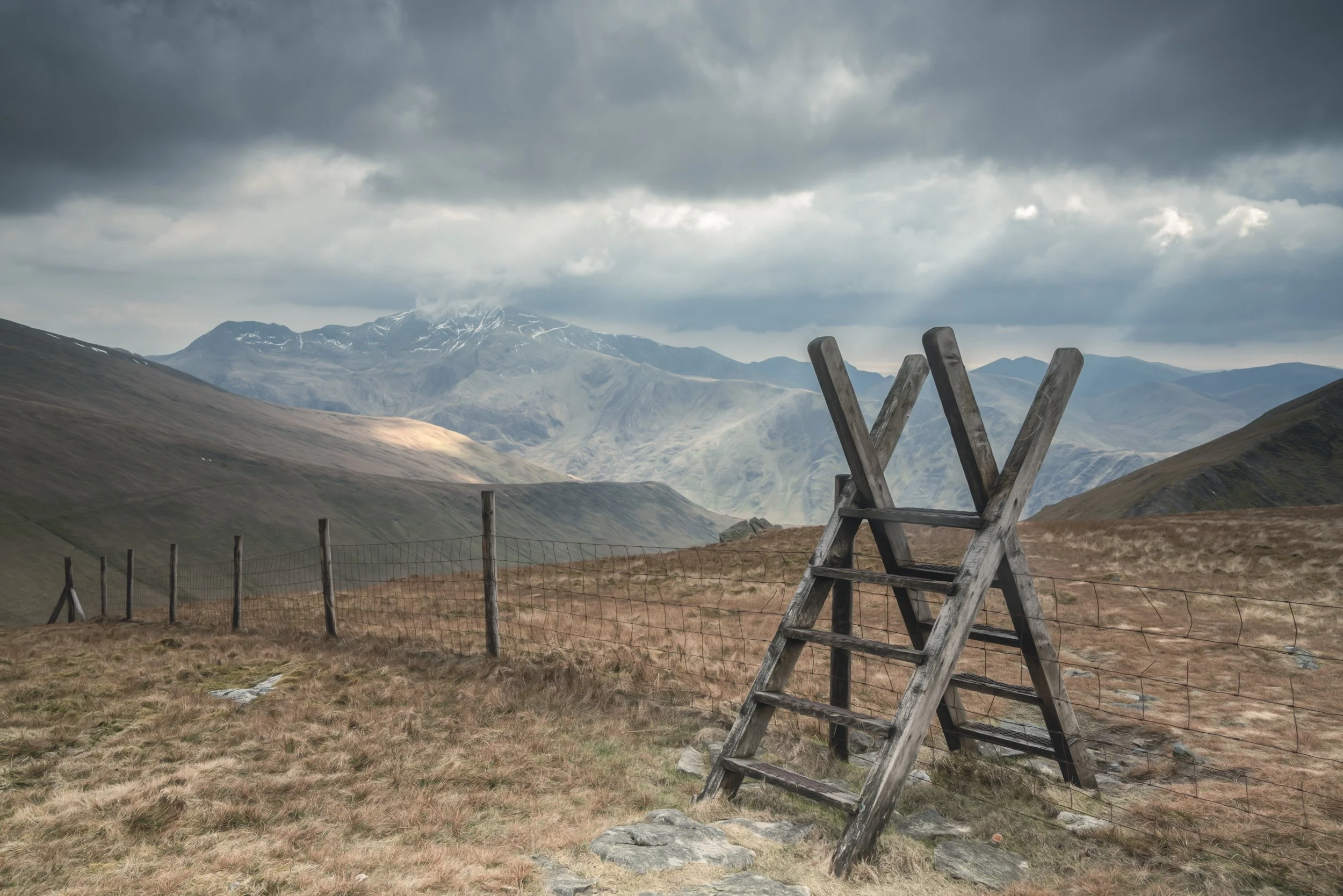 stile-fence-mountains-clouds.jpg