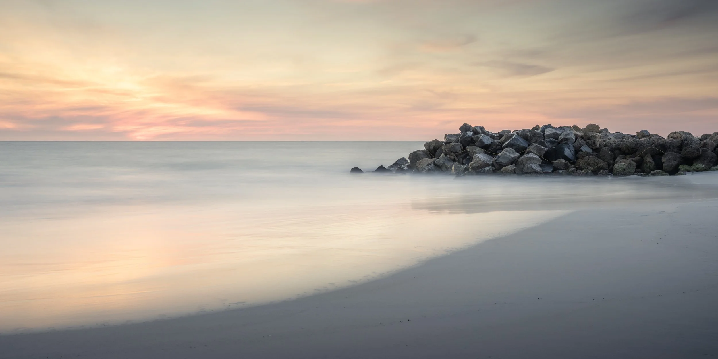 beach-sunset-ocean-groin.jpg