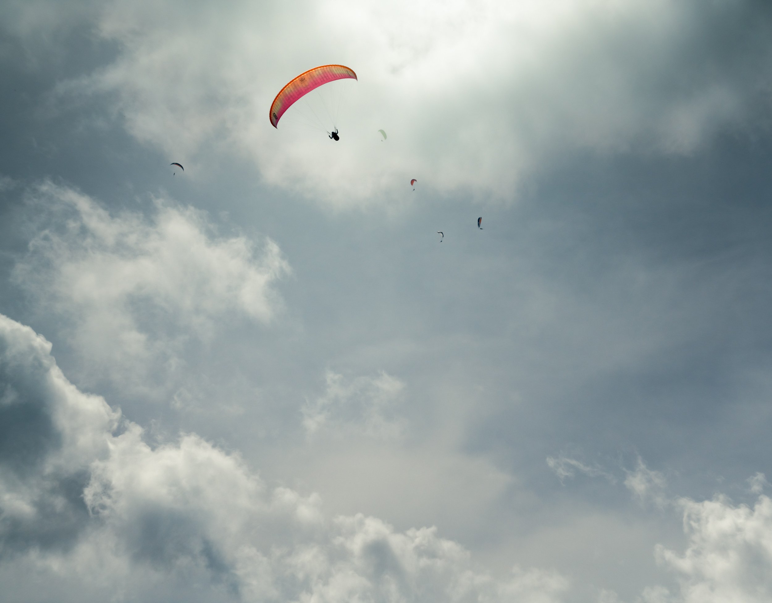 paraglider-clouds-sunshine.jpg