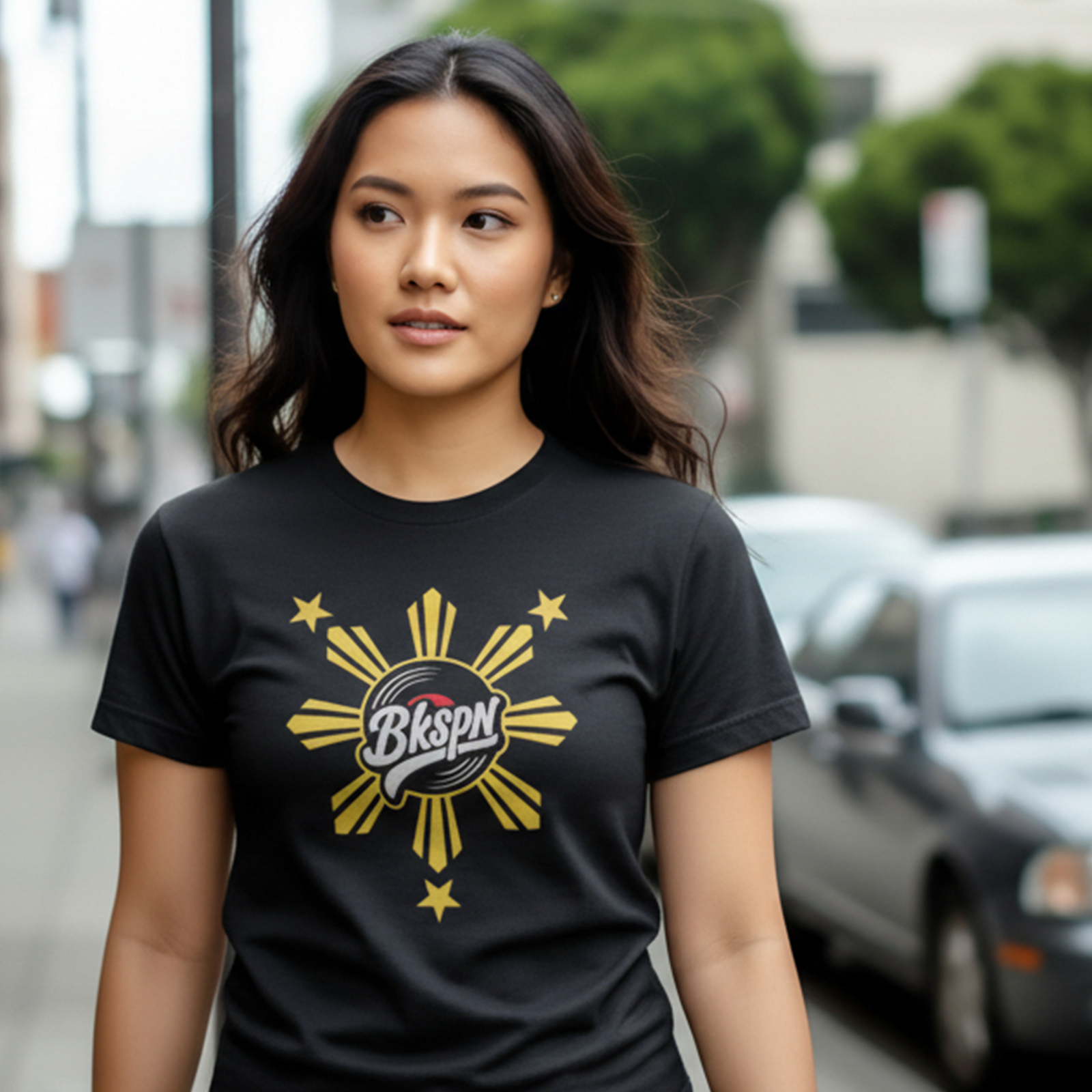 Black BKSPN Filipino pride t-shirt with sun and star logo on front and For the Culture text on back.