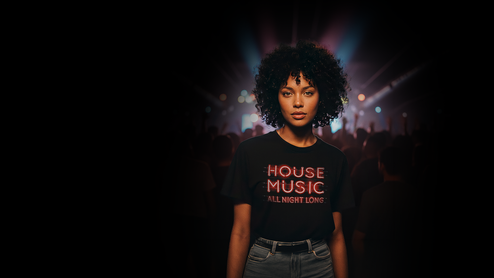 A young man standing by a chain-link fence at sunset, wearing a black hoodie with a BKSPN logo on it.