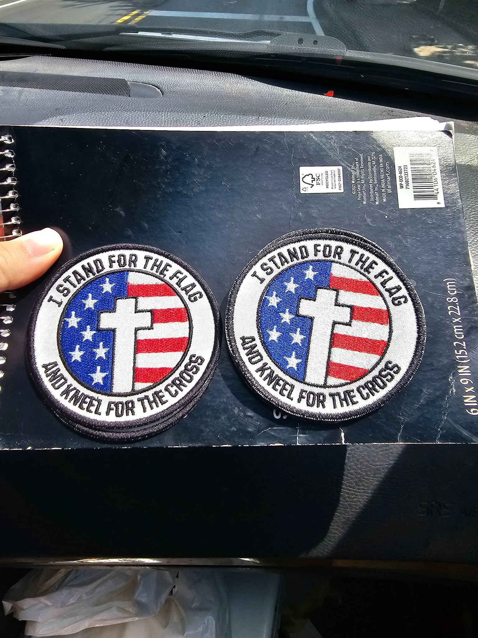 Two embroidered patches with an American flag background, a white cross in the center, and the text "I STAND FOR THE FLAG AND KNEEL FOR THE CROSS" around the border.