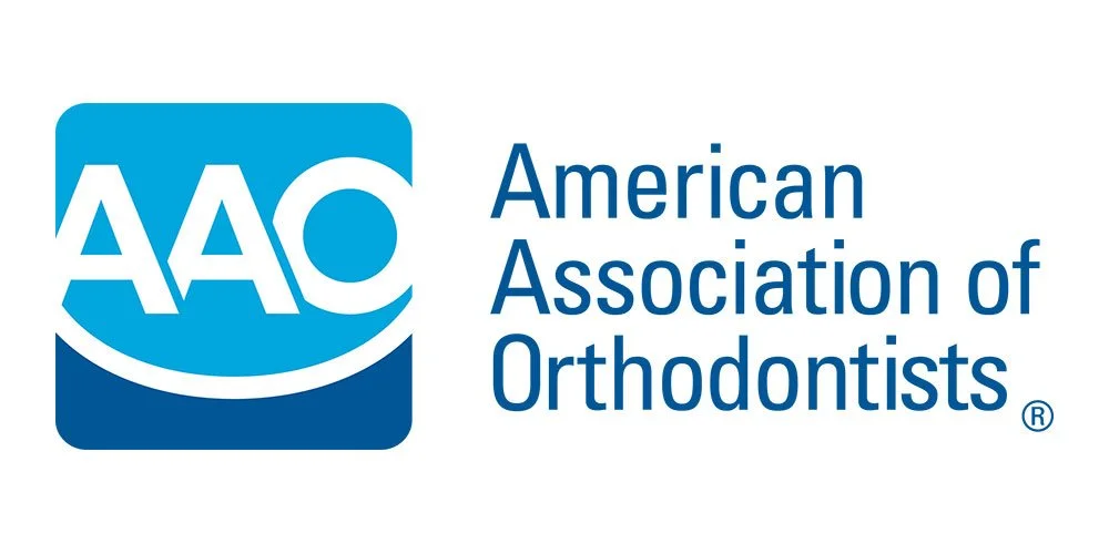 Logo of the American Association of Orthodontists with blue and white colors.