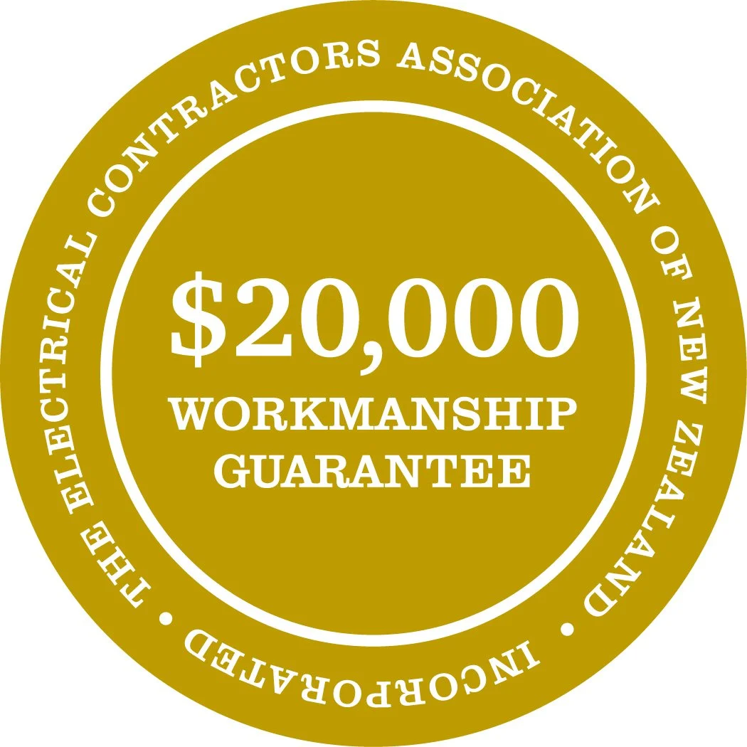 Gold seal with white text stating '$20,000 Workmanship Guarantee' and outer circle reading 'The Electrical Contractors Association of New Zealand Inc Approved.'