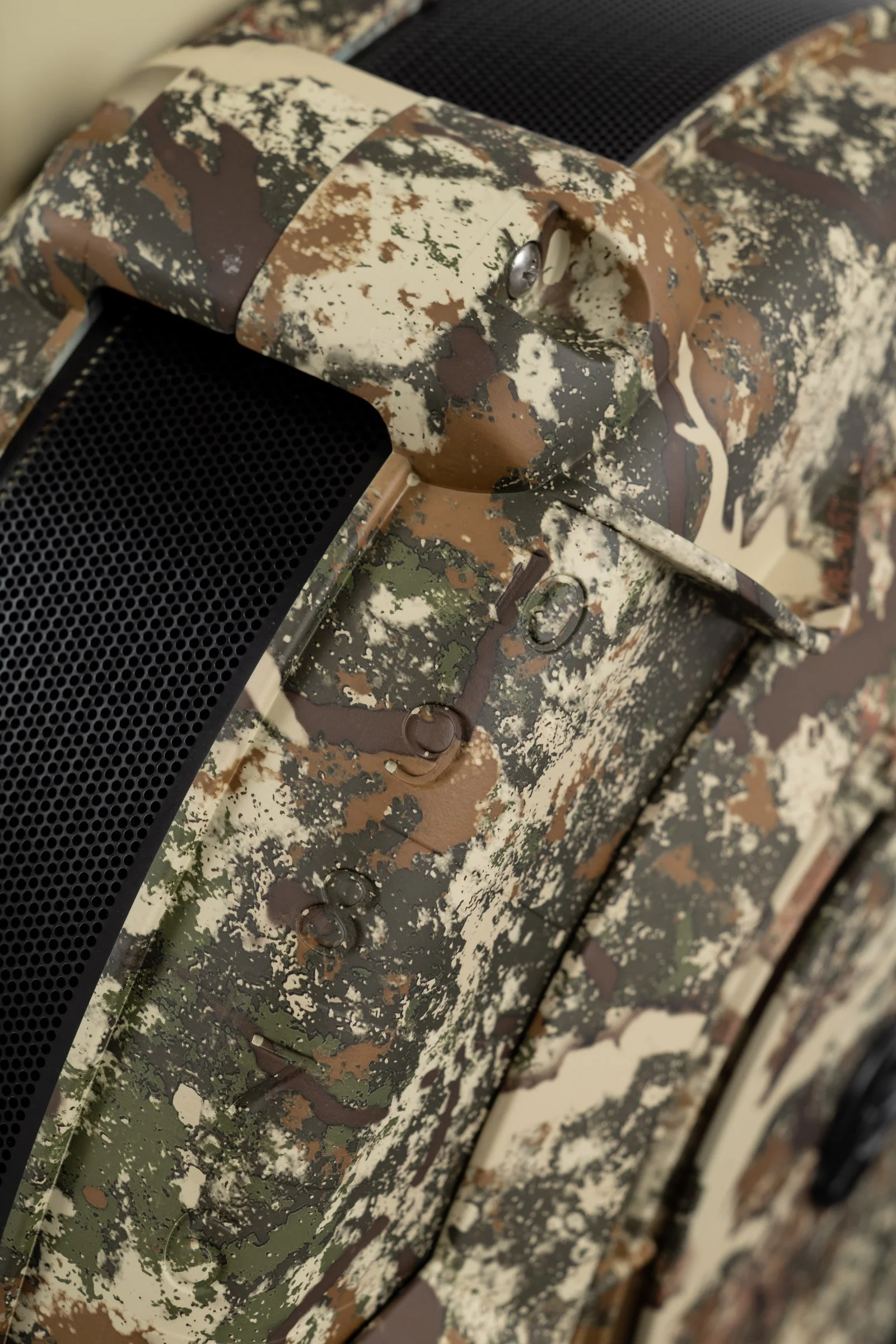Close-up of camouflage finish and flywheel vent