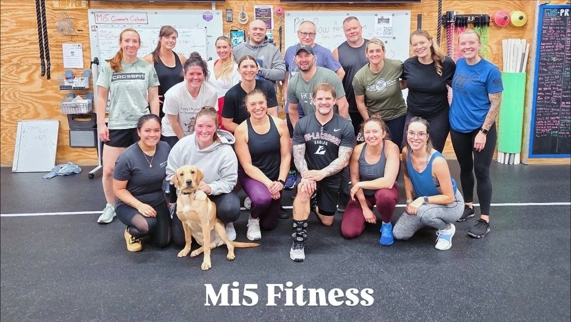 Mi5 Fitness participants pose for a team photo at DT’s Row 2025.
