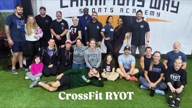 CrossFit RYOT participants pose for a team photo at DT’s Row 2025.