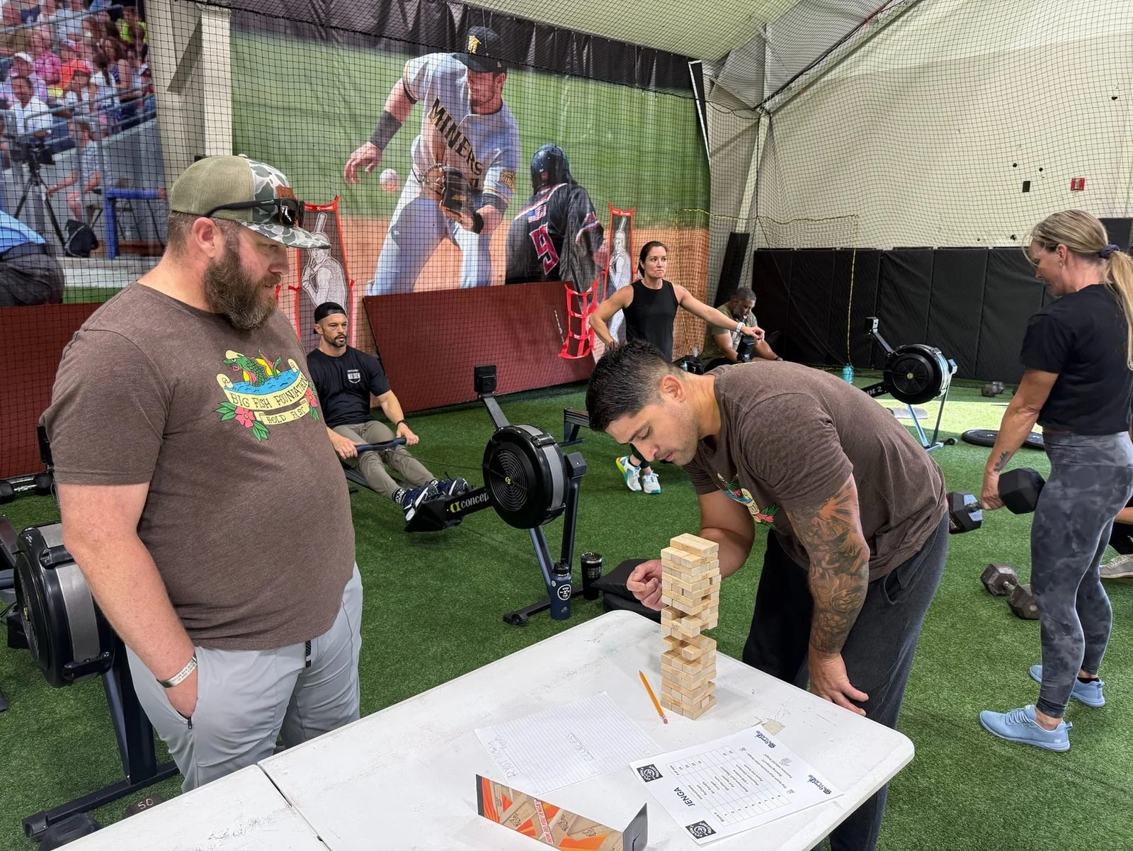 Participants play a wooden block game during DT’s Row 2025.