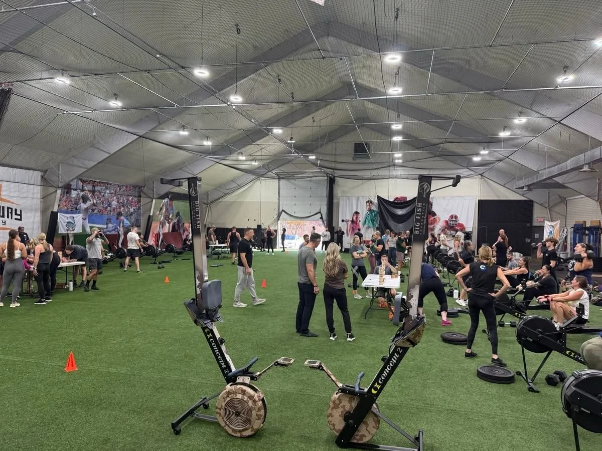 Participants gather across the DT’s Row 2025 workout floor.