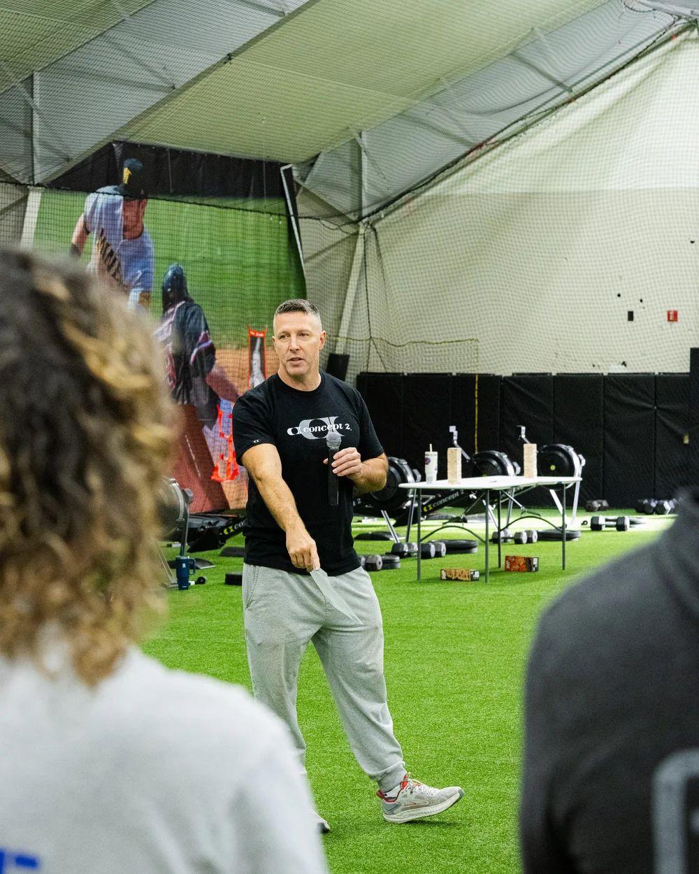 DT speaking with athletes and supporters at the 2025 Skylands Community row