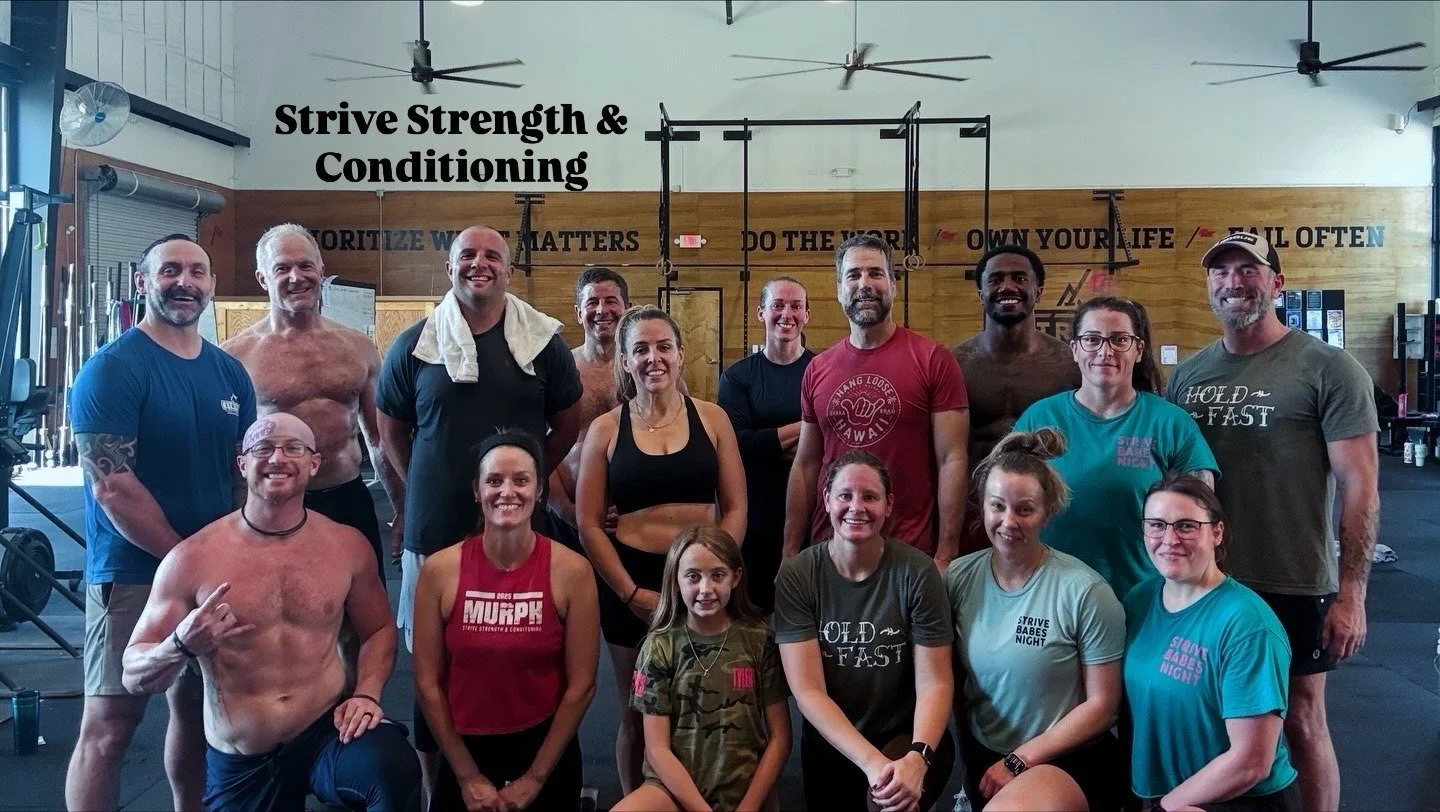 Strive Strength & Conditioning participants pose for a team photo at DT’s Row 2025.