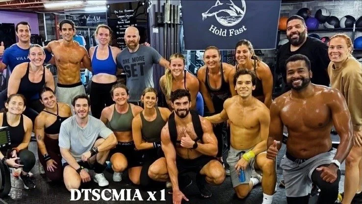 The group labeled DTSCMIA x 1 poses at DT’s Row 2025.