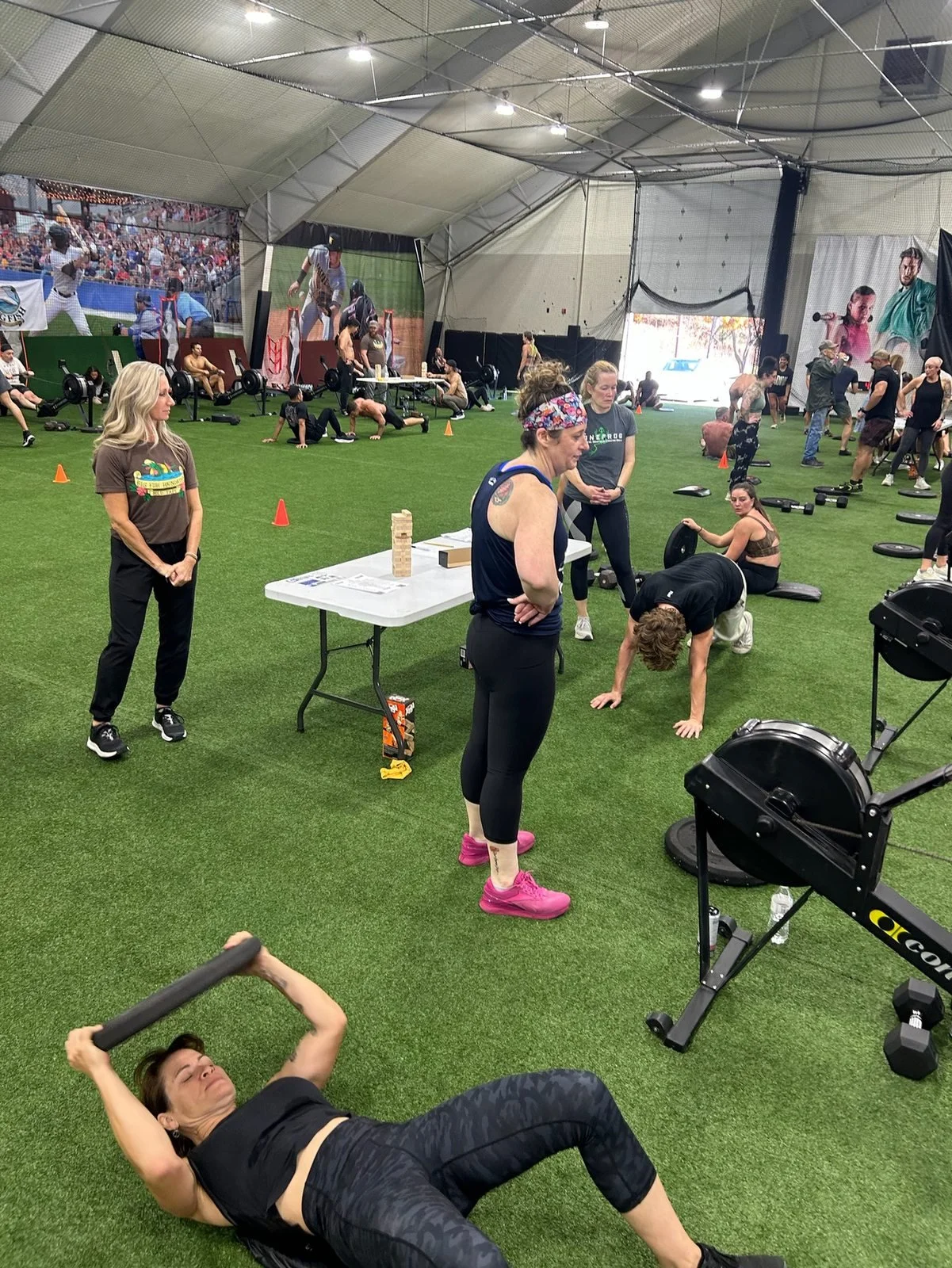 Participants work through rowing and floor exercises at DT’s Row 2025.