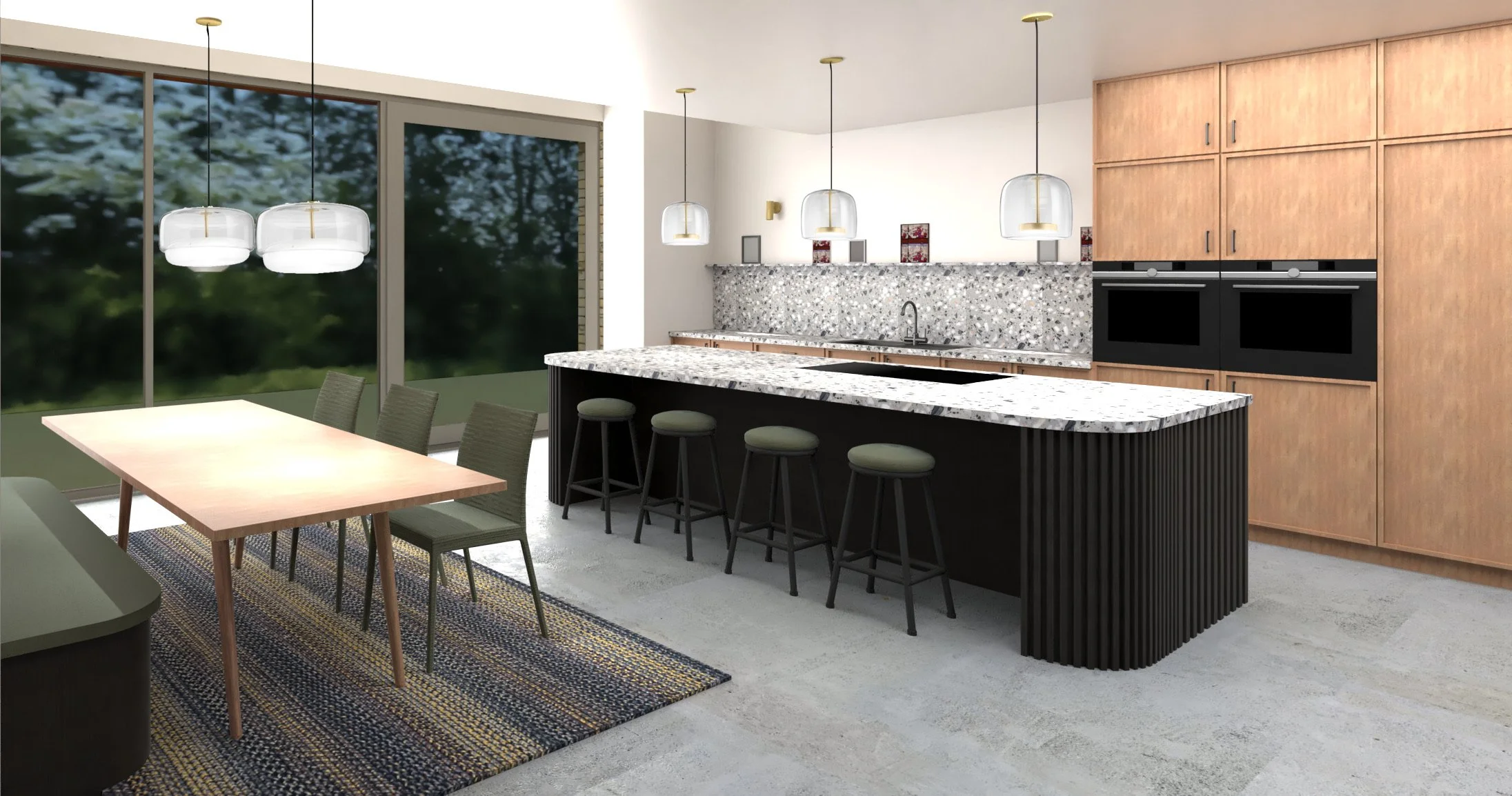 Modern kitchen with large window, island with a white granite countertop, five bar stools, wooden cabinets, built-in black ovens, and a dining table with six chairs near the window, overlooking greenery.