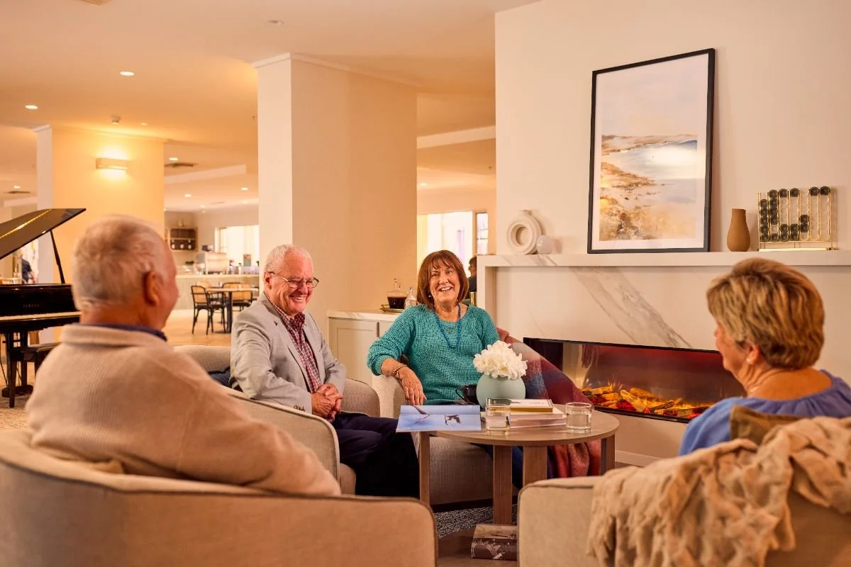 Domaine-Lifestyle-Residents-Around-Fireplace-1200x800.jpg