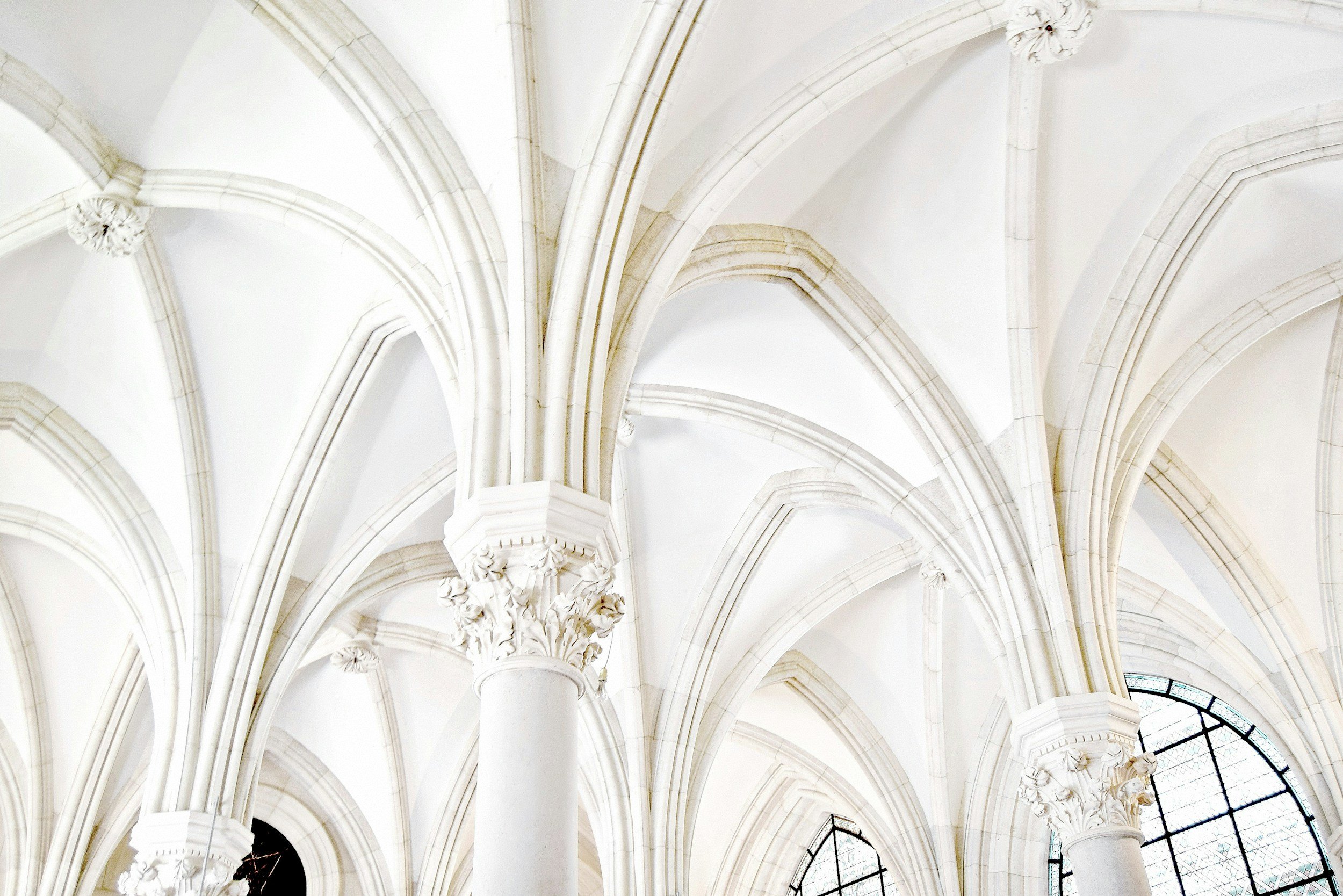 Abstract image of high arches with sculptures representing the essence of The Ashmere.