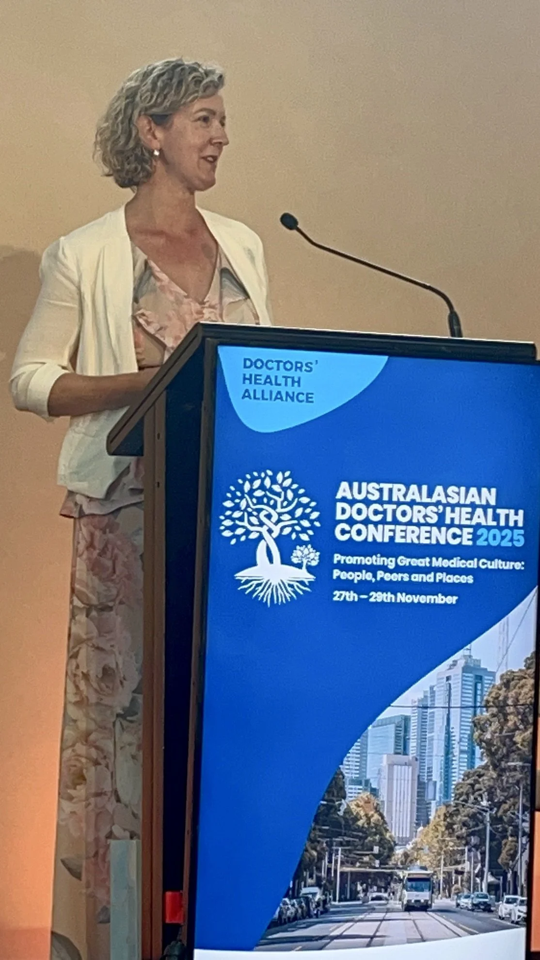 Dr Jo Braid presenting at the Australasian Doctors' Health Conference 2025 to 250 people.