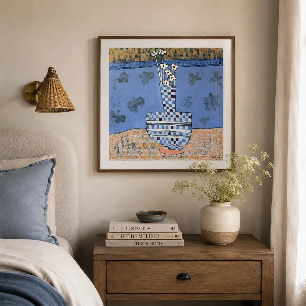 Stillness in Blue fine art print styled in soft neutral bedroom with walnut frame