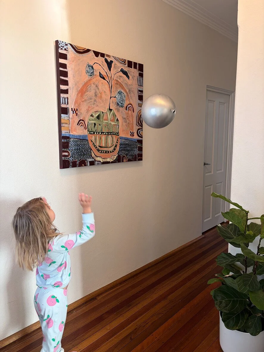 Hidden in the Leaves original abstract still life painting by Anita Robinson displayed in a Sydney family home