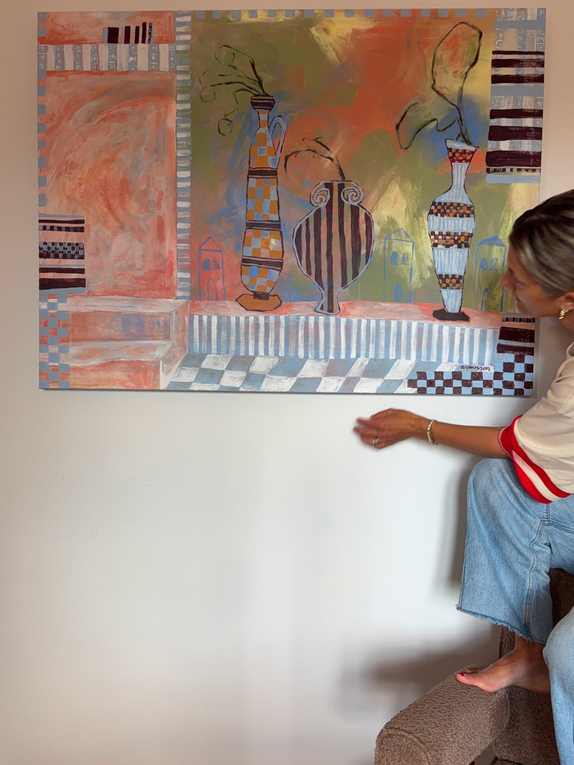 Anita Robinson with her original abstract painting Late Checkout