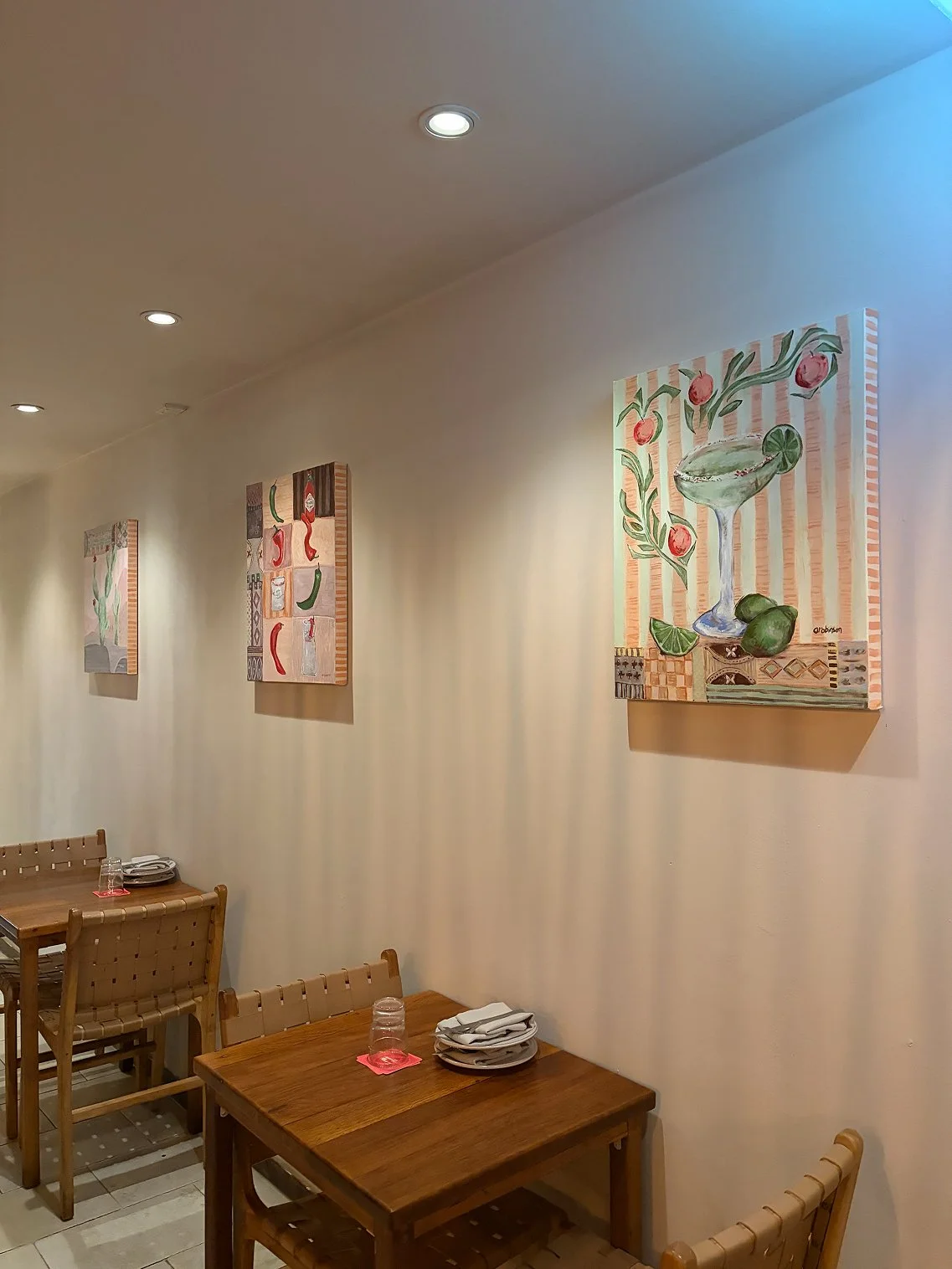 Side view of original abstract paintings by Anita Robinson Art at Tijuana's Manly, showing the 3.8cm canvas depth and textured detail.