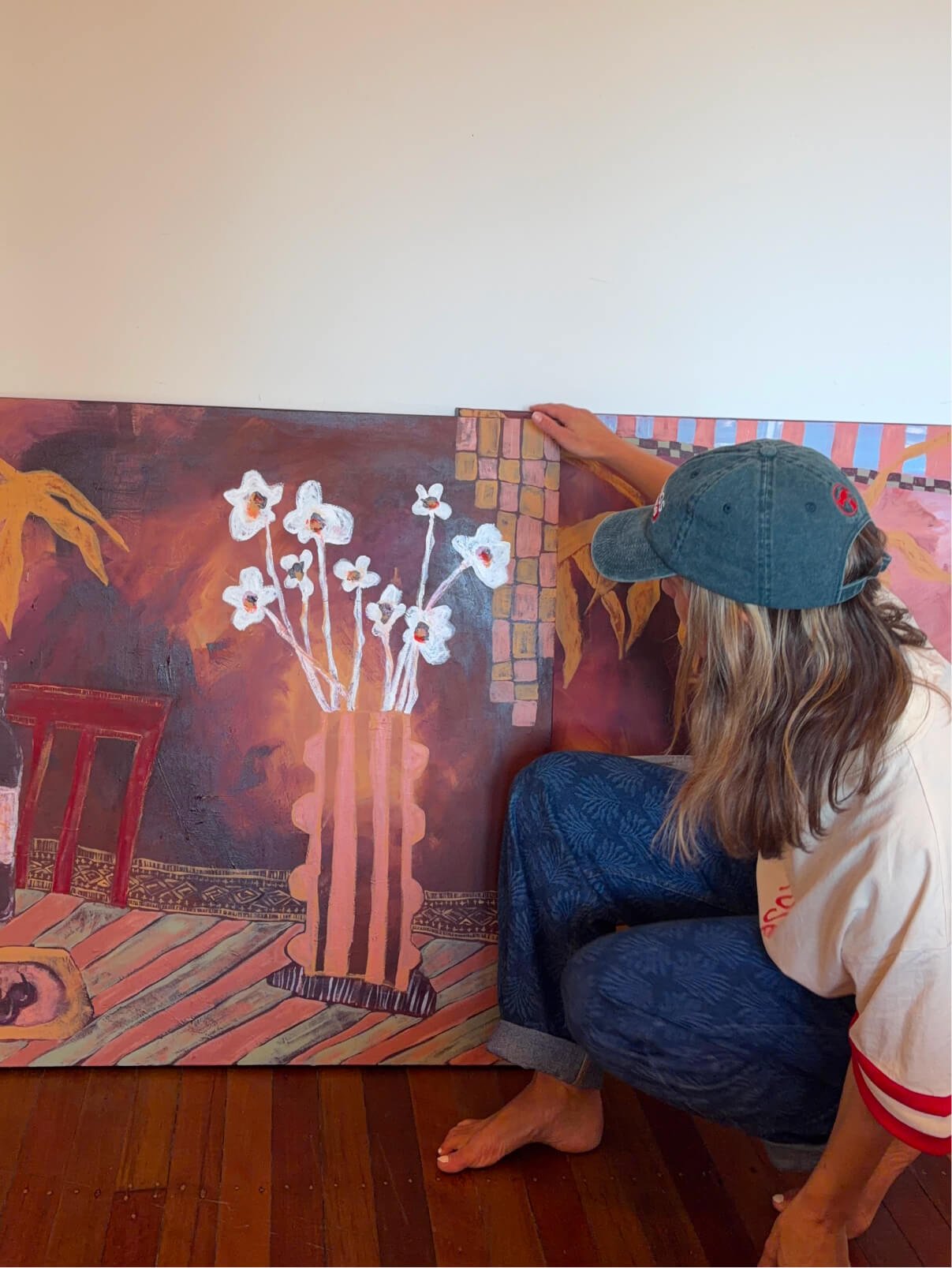 Sydney artist Anita Robinson with two large original still life paintings