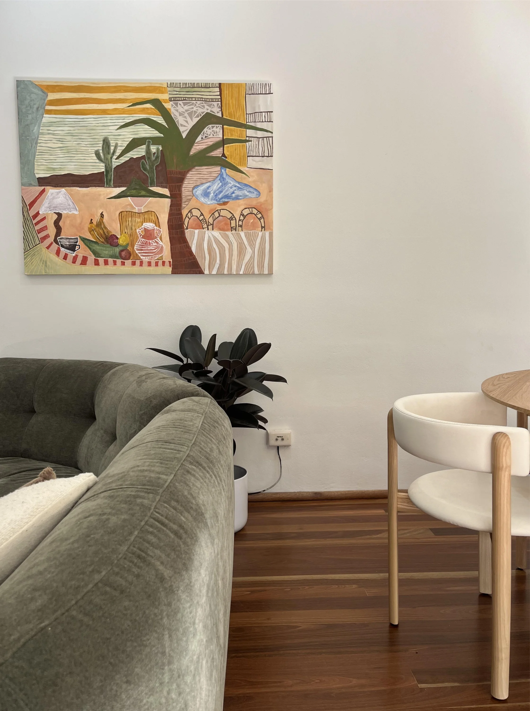 Mockup image illustrating tips for choosing the perfect original painting for your space, focusing on size, color, and interior design placement.