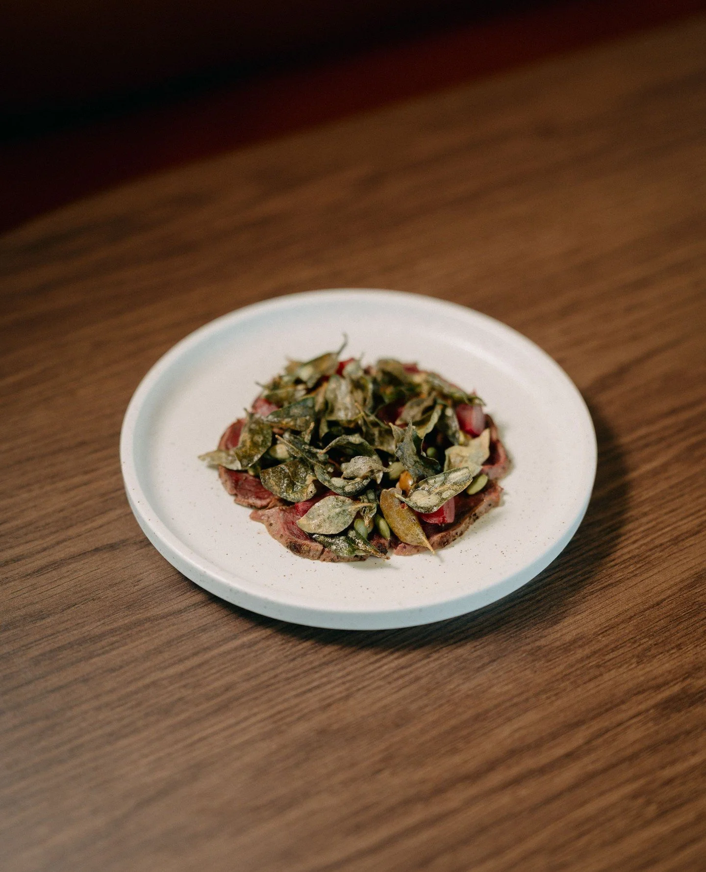 declared our signature by @chefbrentpotuszynski - our kangaroo is a defining staple of our menu (and your new favourite plate).⁠
⁠
&rarr; ⁠seared paroo kangaroo, black garlic, pickled grapes, pepitas, saltbush⁠
⁠
⁠⁠soda rooftop⁠
◦◦ open from 12pm dai