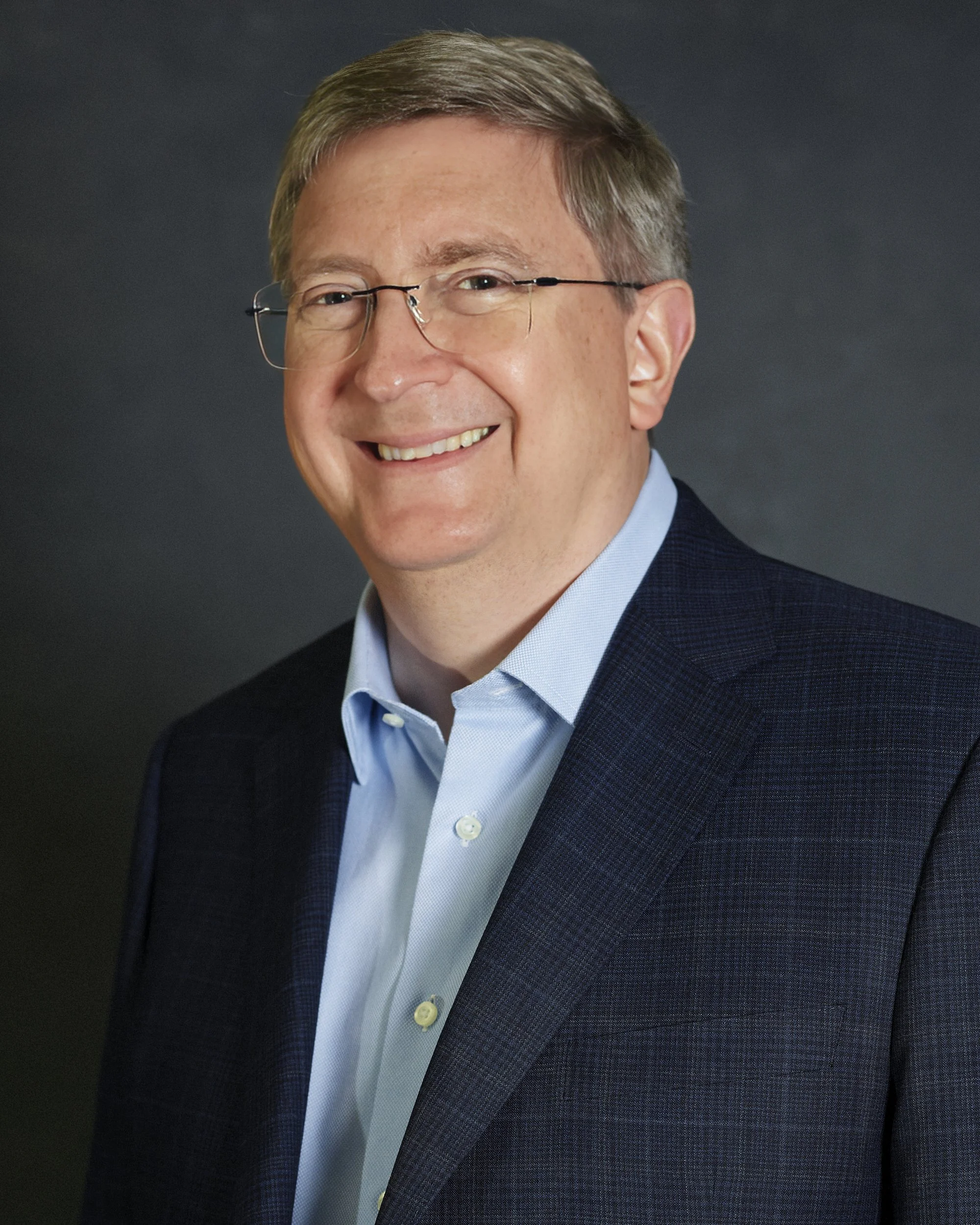 Andrew Headshot35805-topaz.jpg
