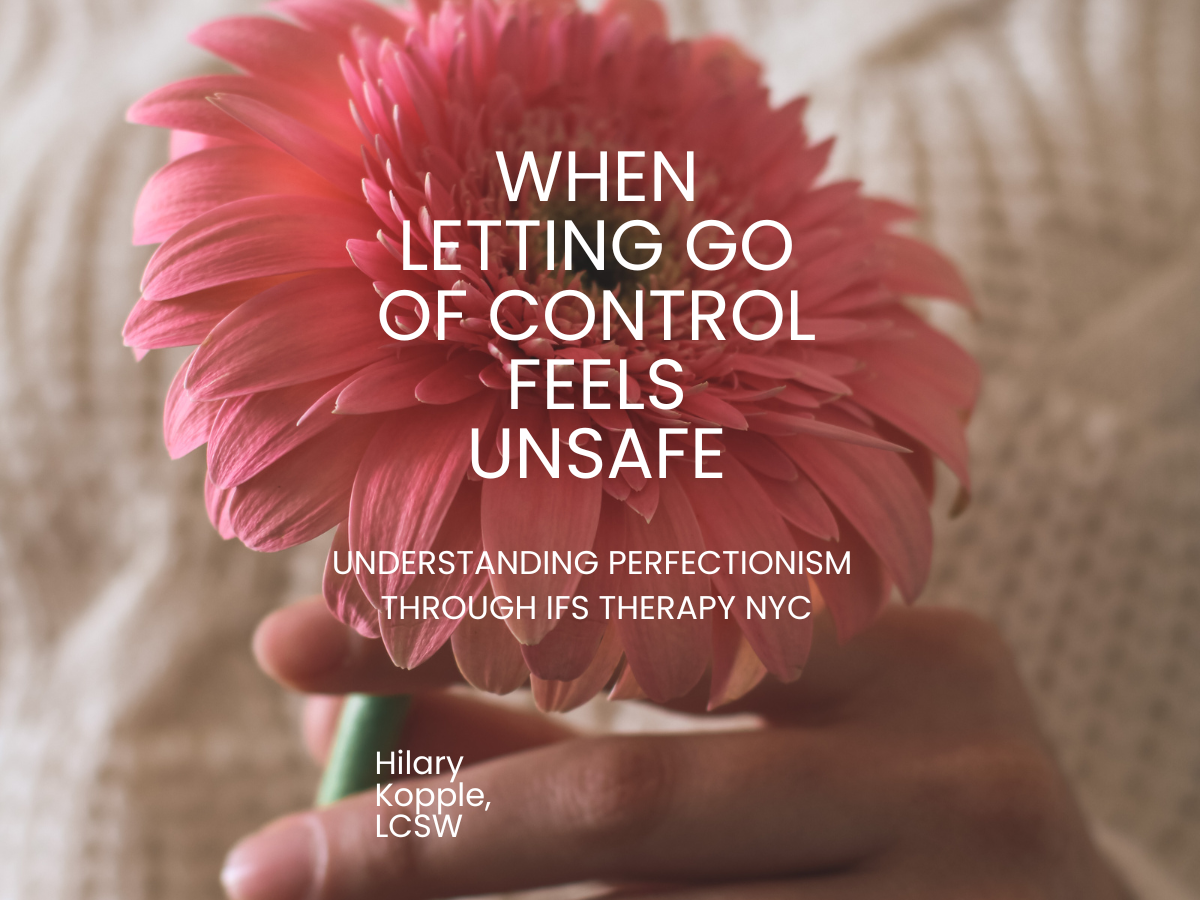 woman in white sweater holding pink flower after ifs therapy nyc healing