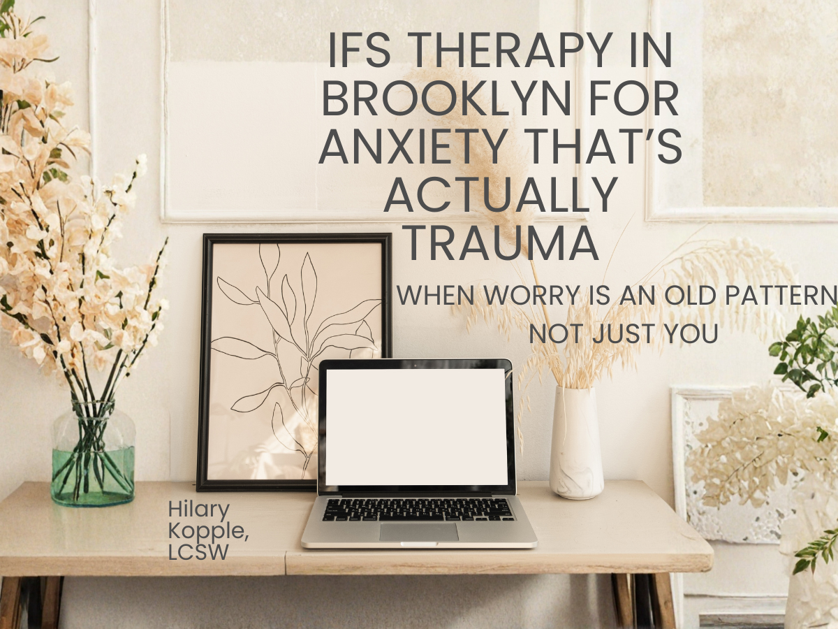 Laptop and framed botanical print on a desk with dried flowers, text reads IFS Therapy in Brooklyn for Anxiety That's Actually Trauma