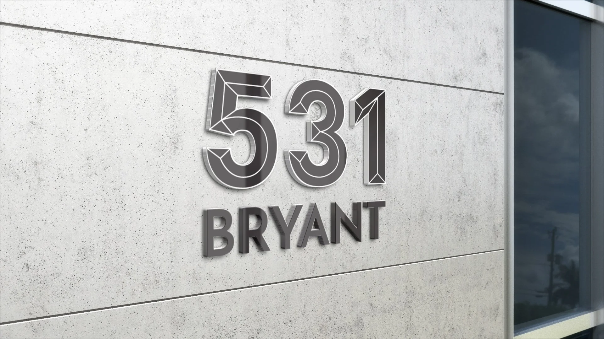 531 Bryant lettering: 531 Bryant logo as 3D lettering on a concrete wall, inspired by the building's window frames. Logo design created for JLL US properties.