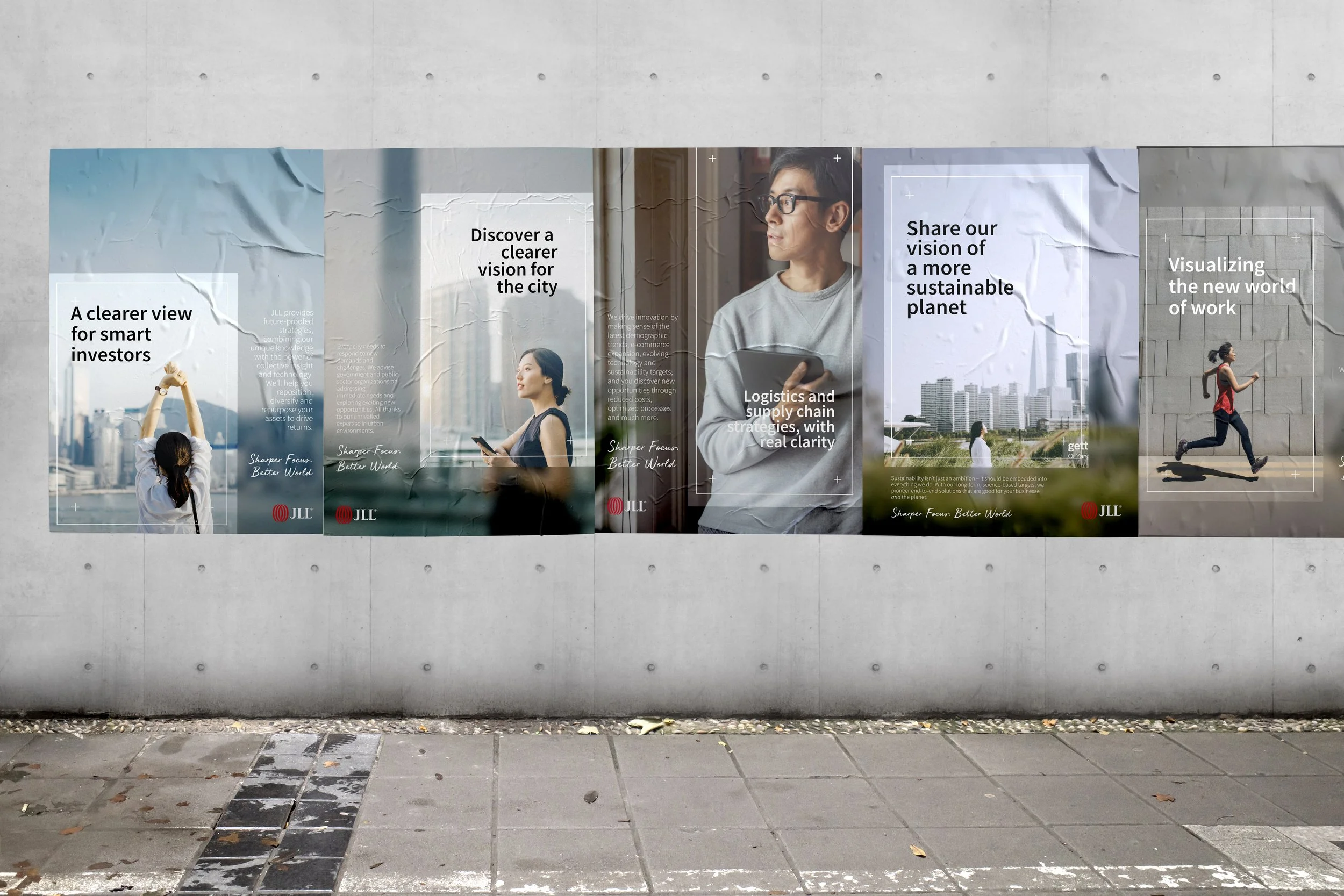 Posters on a concrete wall: JLL China Six Pillars campaign posters, using a viewfinder graphic to frame each message.