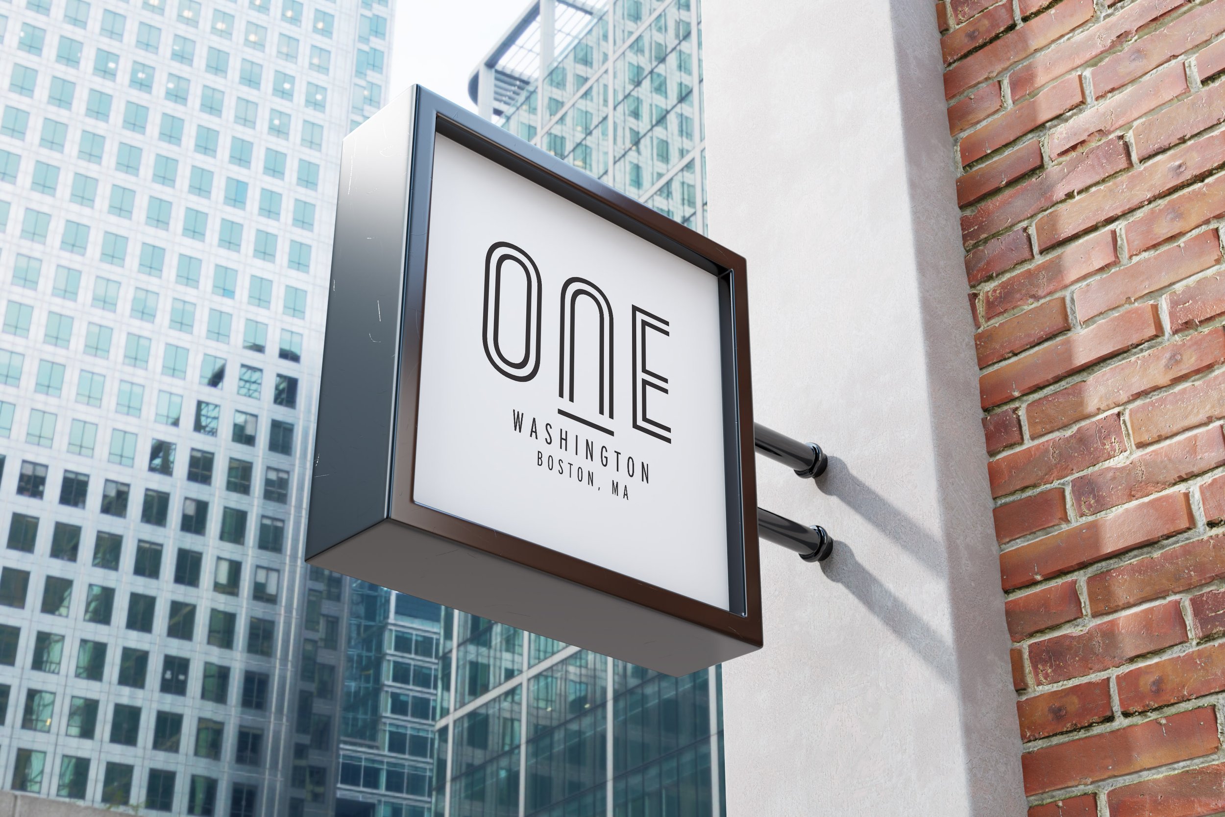 One Washington sign: One Washington logo on a projecting sign in Boston, with the 1 drawn from the building's window grid. Logo design created for JLL US properties.