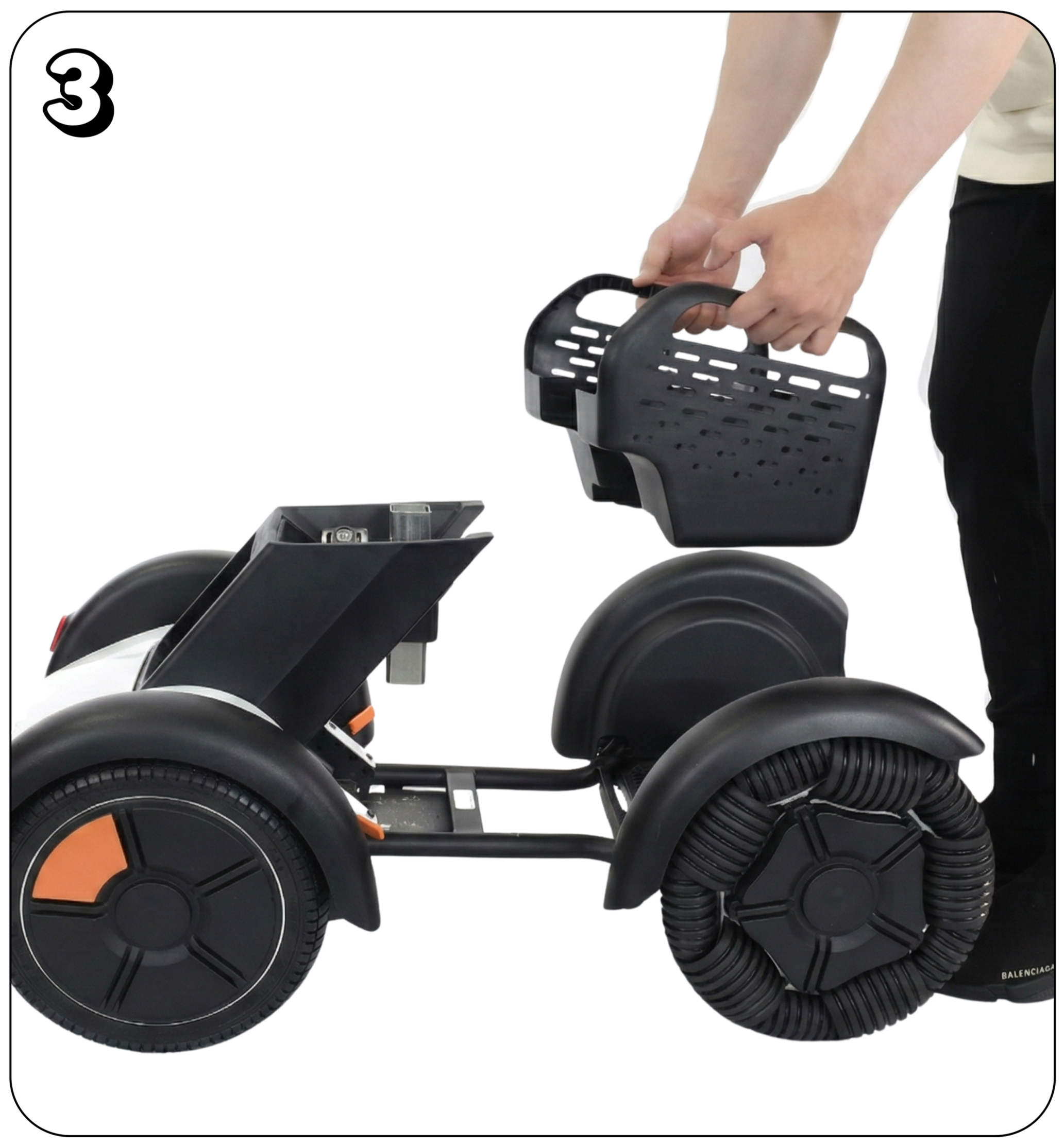 Person lifting the storage basket of a black robotic scooter with large wheels.