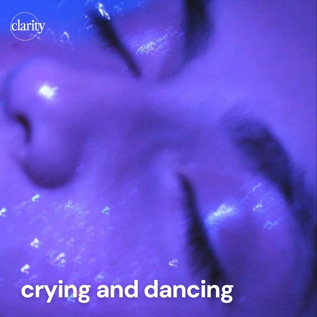 Abstract purple-toned close-up of a face with glossy texture, used as the cover for the Crying and Dancing playlist. The image reflects a moody, emotional yet danceable music vibe.