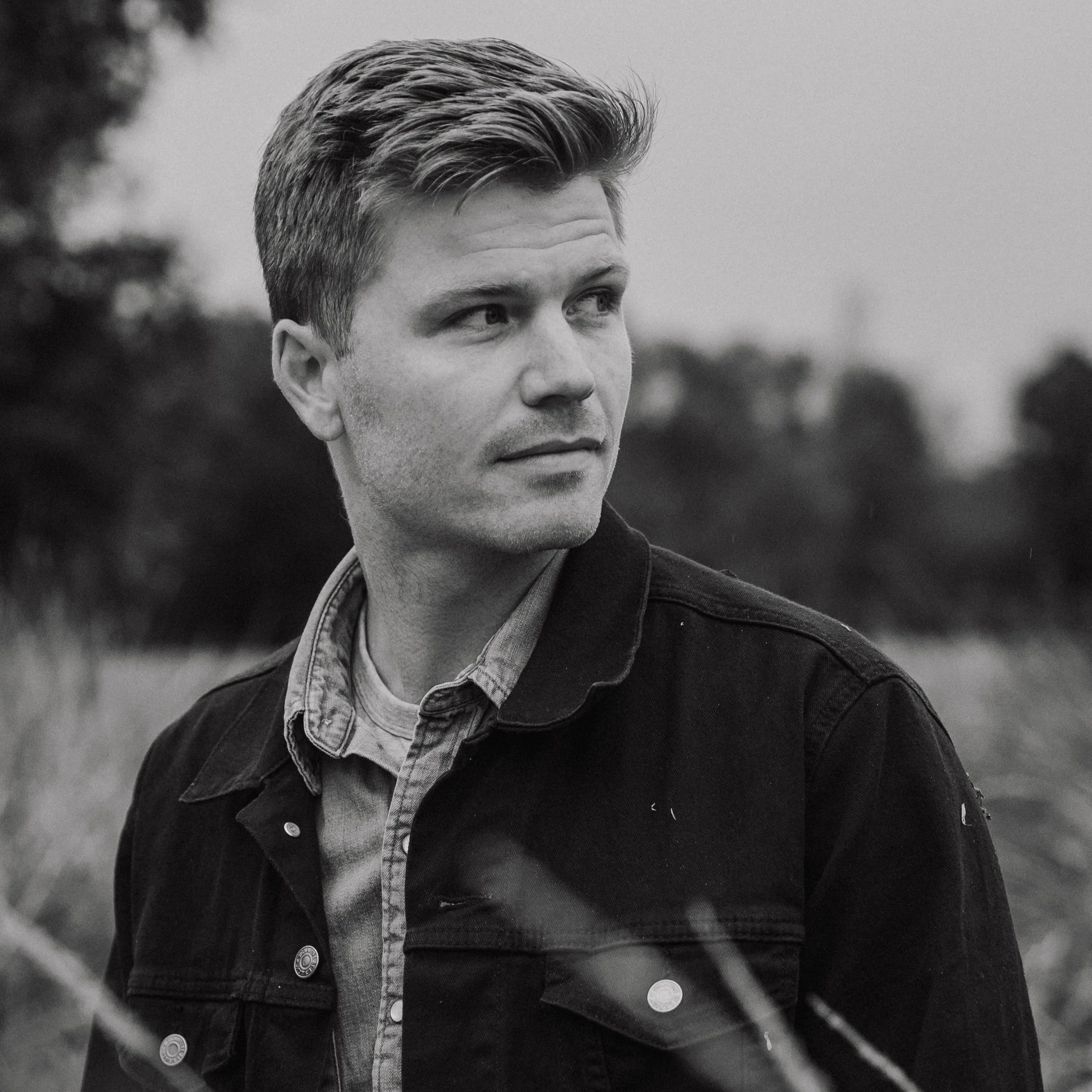 Portrait of Riley Burns, featured on the Clarity Indie 50 playlist