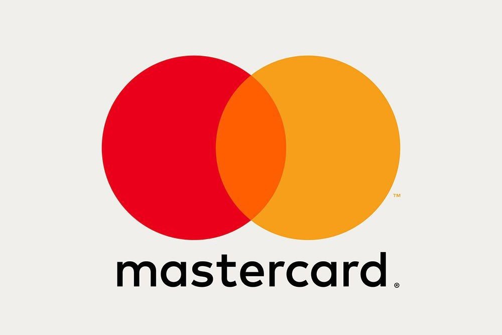 Mastercard logo with two overlapping circles, one red and one orange, above the word 'mastercard' in black lowercase letters.